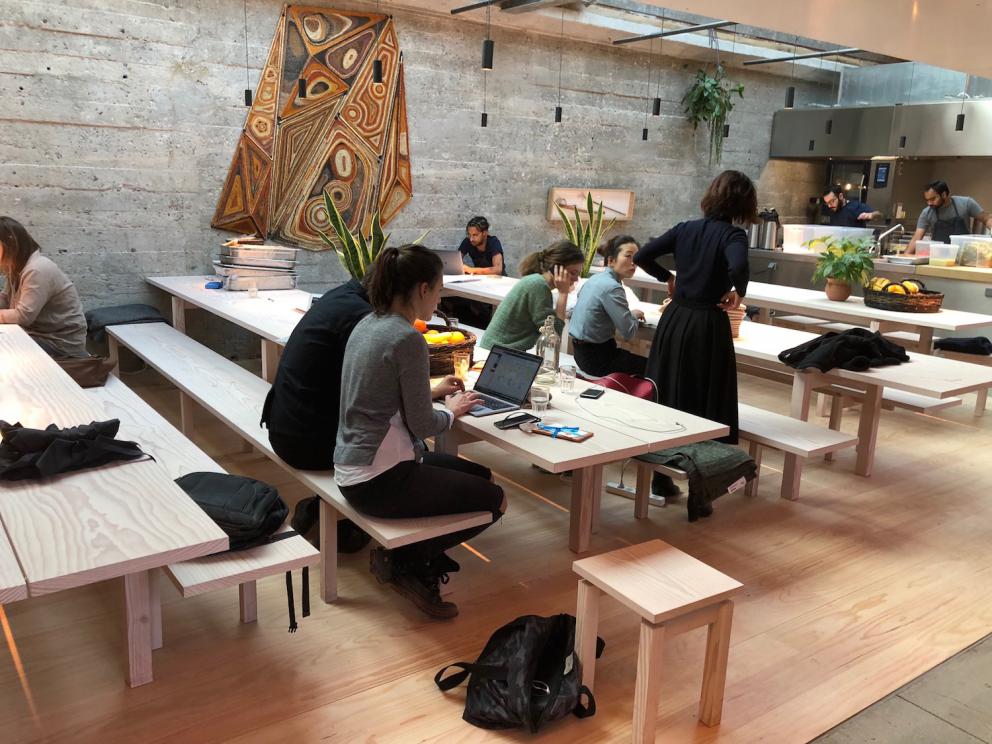 Photogallery






Noma 2.0 is in Christianshavn, the same neighbourhood as the first Noma. They’re 1.5 km apart, a 15 minutes’ walk. This picture shows the distance: to the right, there’s the warehouse of the old location (in Strandgade 93), to the left the smokestacks of Amager Bakke, the futuristic incinerator below which stands the new Noma (in Refshalevej 96)









Weather permitting, you can have a peaceful walk between the previous Noma to today’s Noma 









The new Noma is on an isthmus surrounded by canals. In the future they also want to reclaim some small parts for hydroponic farming









Bucolic scene with incinerator









Bikes left outside Noma. It’s the favourite means of transport among employees and interns









The long path taking you to the restaurant. The fence on the left shows how works are still in progress









On the two sides of the path there are the two new sections of the "Noma village", each with its specialty: grill, hot dishes, snacks, fermentations... In one month’s time, behind the fence we’ll have greenhouses, the test kitchen and the bread making area









To the left, before arriving at the restaurant, the future test kitchen. This will be run by Danish Mette Søberg with Riccardo Canella. "My first challenge?", reveals the latter, for a long time sous chef here, "is to work on the extraction of essential oils" 









The future Test Kitchen









The temporary gangway to the restaurant









Looking from the door to the restaurant, there’s a lake and the smokestacks puffing vapour from the Amager Bakke incinerator. It’s a futuristic project, both in terms of sustainability and architecture. It’s also known as Amager Slope or Copenhill, and its author is starchitect Bjarke Ingels, the same who designed the new Noma. Gradually opened in 2017, it transforms waste into electricity. The goal is to donate electricity to 62500 houses and hot water to 160000. It’s part of an ambitious project to transform Copenhagen into the first city in the world in terms of zero carbon dioxide emissions by 2025. By autumn this year, Amager Slope should open its ski slope, a climbing wall and a hiking track. You’ll be able to slalom on top of the incinerator









The windows from the dining room









Work is still in progress (photo taken on Thursday 22nd February 2018)









Traces of the old building, with barbwire. During WWII, they built bombs here









A view of the dining room at night (photo from Instagram/James Spreadbury)









The entrance to the restaurant









The usual ritual: a welcome from the entire staff, led by Rene Redzepi 









Behind the entrance, there are formaldehyde tanks with creatures from the abyss, shaped as in Damien Hirst’s works. The first image once you’re inside is to reproduce a Scandinavian village









The service kitchen is larger, more spacious and a completely open view from the dining room: "It’s the heart of our Scandinavian village", says Canella. There are 30 cooks working here now. 10 more, compared to the previous Noma









Large skylights above the cooks









There are currently more than 100 people working at Noma, of whom 63 are cooks - 26 employed, and 37 as interns









There’s fire in the kitchen, for the first time









On average, the dining room can host 40 people. "However", complains Redzepi, "there’s always someone who turns up with more people than the ones booked"









While the dining room is set, the outside space still need to be defined









The staff made the dining room decorations. There are no overly expensive designer objects









Dried fish









Seaweeds hanging from the ceiling









Dried octopus heads preserved in salt (with a balloon inside)














Bjarke Ingels and Redzepi’s plan included the wish to recreate a Danish farm









The luminous private dining room









The counter in the dining room. They drew the beams from the canals around the restaurant














The mise en place, bare and strictly without tablecloths









Water jug, candle, flower vase









A warm cloth, to begin with









Australian James Spreadbury, restaurant manager and partner at Noma









Welcome drink: Champagne extra brut Blanc d'Argile from Domaine Vouette et Sorbée









Sea Snail broth. The welcome dish at Noma is, as usual, a hot “soup”









Stefano Ferrano, from Torino, presents the following dish. There’s always a large Italian colony at Noma









Venus clams. Molluscs from Limfjord (Denmark) mixed with decorative clams, typical of Noma. Beside them, shells with blackcurrant oil and “Danish curry”, made with toasted coriander seeds, fennel and fennel seeds









The lid above the following dish. The mussels are not edible









Best of the mussel. Mussels open in a pan with water of fermented barley. «We recreate the mussel», says Canella, «using just the flaps, the best part». The paste is made with scraps from the mussel, cooked in smoked butter









The next dish is conceived and served by Riccardo Canella, the Paduan sous chef who conquered Redzepi, here with dining room intern Feline Hansen









Dried fruits and shrimps. In this case, the heads are not a decoration, but you must suck them –best not eat them because of the bones: they’re filled with a lovely prawn cream. The small crustaceans are still alive when they arrive on a ship straight from the Norwegian fjords









Inside, under the prawn broth skin, there’s fruits and vegetable preserved from the previous summer with raw prawns and gooseberry sauce with blackcurrant oil









How about beverages? There are three options, as usual: wine pairing (6 glasses plus a beer plus sake, 150 euros), juice pairing (juices and extracts, 110 euros) or a choice from the list. They recommend Champagne Chut... Libre from Val'Frison pour Dominique Derain, 50% Pinot Noir, 50% Chardonnay created by a couple who met at the old Noma. Well bodied, it will be a good match throughout the meal









As usual, the wine list starts with Champagne: the cheapest is 1400 crowns (190 euros)









White wines begin with labels from cold climates: first Austria, increasingly popular for its natural wines, then Germany, then all the others









How about Italy? Few names, among the white wines, from North and South









A dozen red/orange wines









Sea star, that is to say Cured trout roe and eggs, the emblem dish of this new era. They recommend moving the teaspoon from the heart to the edges of the tentacles. Aesthetics win over taste









Jellyfish. The jellyfish gel in the middle is in fact a clarified broth of calamari and recalls the texture of jellyfish. "We tried to cook jellyfish in 300 different ways but none was convincing so far". All around, pickled seaweed. The gel is almost tasteless, it serves to clean the palate after the pickles









Rene Redzepi himself presents the content of the first Seafood platter.









French style service with a small plate below for the empty shells









It’s made of two (per two) pieces: queen clam and mahogany clam









The Queen Clam is a very small variety of Norwegian scallop, seasoned with a vegetal reduction made with cucumber and peas miso. The red tip is the coral. "You should eat it using the top shell ", recommends Redzepi









The Mahogany clam is a centennial clam from the North Sea, very popular in Denmark and Iceland. «You can tell the age by the number of rings, like with trees», says Redzepi, «In 2007 they found one that was 450 years old. We’ve had it in the menu for a decade or so». The razor clam shell serves as teaspoon









Inside, there’s obviously not just a bare Mahogany. «We open it when the client arrives», says Canella, «remove the entrails and then slice it so as to preserve its firm texture». It’s seasoned with stir-fried gooseberry, capers of blackcurrants and blackcurrant sprouts preserved in vinegar. The sauce is made with mussel water









A note on the chairs: they’re more minimalistic. They’re no longer covered in sheepskin or leather from other Danish animals, in the style of Noma 1.0. The most significant element is the napkin: if you go to the toilet, they no longer replace it with a new one. There’s the old one, tied to the chair. "This is sustainability", they explain









The second seafood platter. It’s made of Sea cucumber and sour cream in various textures, including «chicharrones» (at 9 o’clock), sea urchins (at 12 and 3) and gigas oyster (at 6)









Sea urchins pressed in fresh cream and pumpkin seeds









Giga Oyster, a huge oyster from the Pacific, quickly steamed and garnished with pickles. Noma only reserved one thousand of these. In the menu until available









The following dish, off the menu, is again from Canella: horse mussel ragout, rare specimen of which 30 arrive at 'Noma each week









They cook the mussel as if it were kidney, in a sort of Bolognese sauce but with ginger. Ginger? "Yes, we’ve decided to include it, as with other spices, after our Mexican experience"









Another Italian presents a dish, Edoardo Fiaschi from Prato, at Noma for 3 years now









Squid in seaweed butter. An almost neglected Danish squid lightly seared in fermented koji oil, rolled and seasoned with seaweed butter and served on sticks of blackcurrant that widen its aromas. Formidable and beautiful









The following dish is inside a nice bee wax container. It’s made with balloons covered multiple times in bee wax. «We spent weeks making them. We’ve made thousands». They’re disposable...









Sea snail and roses. They recommend to: "Eat it keeping the bee wax on your hands "









Sea snail. Another small nibble from the top part of the sea snail, lightly warmed up in water and served on a reduction of lemon thyme









A sea snail toothpick, initially carved by Redzepi himself









Head of the cod, (right), the real main course at Noma









Another rather laborious recipe. «It takes half an hour just to separate the head. We remove the skin, the collagen, we cut mandibles, tongue, cheek and the part behind. We rinse it in water, spices, koji and cook it in the yakitori with a glaze of mushrooms and spiced fennel broth»









You can garnish the cod as you choose, with a paste of ants (top right corner), a slightly spicy emulsion of koji oil, water and horseradish sauce (left) and Danish curry (bottom)









On the side of the cod, there’s also wild garlic seasoned with smoked butter and roasted yeast. Intense flavour









Cod bones after the tasting









An interlocutory snack made of cod cheek









Pickled vegetables and arctic herbs. The only vegetable dish in the menu, marks the passage from savoury to sweet dishes. Between June and August 2018 the menu at Noma will be 100% vegetarian









Preparation time: half an hour! A challenge for the person making it









Mussels appear once again, a classic emblem









This time it’s a dessert in the shape of a small sandwich. Pear and roasted kelp ice cream 









Cloudberries and pinecones. A dessert that continues Redzepi’s saga of unsweet sweets: cloudberries, pinecones preserved in sugar, yogurt snow (by Italian Jessica Natali) and a sea snail made with cloudberry sorbet









Filtered coffee made with stolen kenyoti seeds farmed in Honduras by a Norwegian guy. Italian sommelier Francesca Niro tells us this story. «In Denmark», she says, «coffee is not a final act»









Sugar kelp tart. Tartelletta di alga kelp con pralinato di pino (sul modello di quello di mandorle, autore Canella), panna e crisp di ostrica









Sugar kelp tart. Jessica Natali, 23, from the March, has been at Noma for 4 years now









Natali introduces the last dish, Plankton cake









It’s Redzepi’s tribute to Andalusian chef Angel Leon, the chef who brought the abyss of the sea on fine dining tables. A final trivia fact at the end of the meal: we were never served bread, a historic strongpoint at Noma. "There’s no need for bread in this menu", said Redzepi









With Canella we walk the very long corridor that starts from the opposite side of the room, right after the entrance









It’s the rationalised and enlarged equivalent of the previous Noma’s first floor. Dozens of guys are making the pre-preparations









Canella with Ali Sonko, Noma’s famous kitchen hand from Gambia who then became partner









Sea cucumbers and huge Artic crabs swim in the water tanks














Ants on a shrimp, the emblem of Noma’s pop-up in Tokyo














The new equipment includes a sonicator for emulsions, a Rotovapor, essential oil extractors. Natural extraction, like that of perfumes, is an idea that Canella would like to develop in all possible ways, following the example of Alajmo









Temporary location for wild herbs






