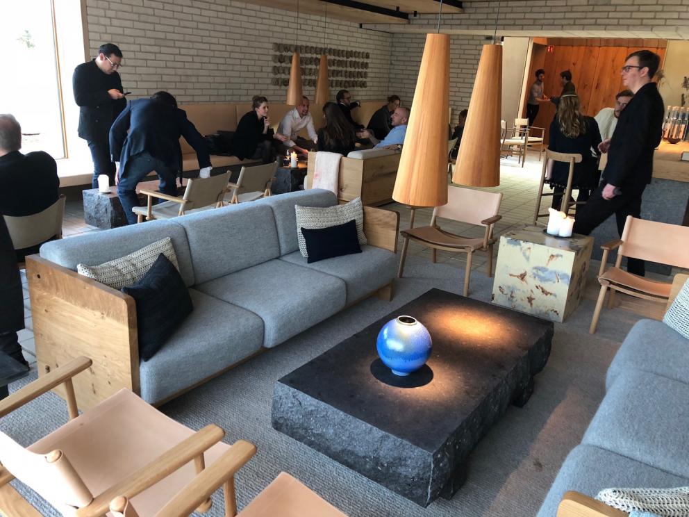 Photogallery






Noma 2.0 is in Christianshavn, the same neighbourhood as the first Noma. They’re 1.5 km apart, a 15 minutes’ walk. This picture shows the distance: to the right, there’s the warehouse of the old location (in Strandgade 93), to the left the smokestacks of Amager Bakke, the futuristic incinerator below which stands the new Noma (in Refshalevej 96)









Weather permitting, you can have a peaceful walk between the previous Noma to today’s Noma 









The new Noma is on an isthmus surrounded by canals. In the future they also want to reclaim some small parts for hydroponic farming









Bucolic scene with incinerator









Bikes left outside Noma. It’s the favourite means of transport among employees and interns









The long path taking you to the restaurant. The fence on the left shows how works are still in progress









On the two sides of the path there are the two new sections of the "Noma village", each with its specialty: grill, hot dishes, snacks, fermentations... In one month’s time, behind the fence we’ll have greenhouses, the test kitchen and the bread making area









To the left, before arriving at the restaurant, the future test kitchen. This will be run by Danish Mette Søberg with Riccardo Canella. "My first challenge?", reveals the latter, for a long time sous chef here, "is to work on the extraction of essential oils" 









The future Test Kitchen









The temporary gangway to the restaurant









Looking from the door to the restaurant, there’s a lake and the smokestacks puffing vapour from the Amager Bakke incinerator. It’s a futuristic project, both in terms of sustainability and architecture. It’s also known as Amager Slope or Copenhill, and its author is starchitect Bjarke Ingels, the same who designed the new Noma. Gradually opened in 2017, it transforms waste into electricity. The goal is to donate electricity to 62500 houses and hot water to 160000. It’s part of an ambitious project to transform Copenhagen into the first city in the world in terms of zero carbon dioxide emissions by 2025. By autumn this year, Amager Slope should open its ski slope, a climbing wall and a hiking track. You’ll be able to slalom on top of the incinerator









The windows from the dining room









Work is still in progress (photo taken on Thursday 22nd February 2018)









Traces of the old building, with barbwire. During WWII, they built bombs here









A view of the dining room at night (photo from Instagram/James Spreadbury)









The entrance to the restaurant









The usual ritual: a welcome from the entire staff, led by Rene Redzepi 









Behind the entrance, there are formaldehyde tanks with creatures from the abyss, shaped as in Damien Hirst’s works. The first image once you’re inside is to reproduce a Scandinavian village









The service kitchen is larger, more spacious and a completely open view from the dining room: "It’s the heart of our Scandinavian village", says Canella. There are 30 cooks working here now. 10 more, compared to the previous Noma









Large skylights above the cooks









There are currently more than 100 people working at Noma, of whom 63 are cooks - 26 employed, and 37 as interns









There’s fire in the kitchen, for the first time









On average, the dining room can host 40 people. "However", complains Redzepi, "there’s always someone who turns up with more people than the ones booked"









While the dining room is set, the outside space still need to be defined









The staff made the dining room decorations. There are no overly expensive designer objects









Dried fish









Seaweeds hanging from the ceiling









Dried octopus heads preserved in salt (with a balloon inside)














Bjarke Ingels and Redzepi’s plan included the wish to recreate a Danish farm









The luminous private dining room









The counter in the dining room. They drew the beams from the canals around the restaurant














The mise en place, bare and strictly without tablecloths









Water jug, candle, flower vase









A warm cloth, to begin with









Australian James Spreadbury, restaurant manager and partner at Noma









Welcome drink: Champagne extra brut Blanc d'Argile from Domaine Vouette et Sorbée









Sea Snail broth. The welcome dish at Noma is, as usual, a hot “soup”









Stefano Ferrano, from Torino, presents the following dish. There’s always a large Italian colony at Noma









Venus clams. Molluscs from Limfjord (Denmark) mixed with decorative clams, typical of Noma. Beside them, shells with blackcurrant oil and “Danish curry”, made with toasted coriander seeds, fennel and fennel seeds









The lid above the following dish. The mussels are not edible









Best of the mussel. Mussels open in a pan with water of fermented barley. «We recreate the mussel», says Canella, «using just the flaps, the best part». The paste is made with scraps from the mussel, cooked in smoked butter









The next dish is conceived and served by Riccardo Canella, the Paduan sous chef who conquered Redzepi, here with dining room intern Feline Hansen









Dried fruits and shrimps. In this case, the heads are not a decoration, but you must suck them –best not eat them because of the bones: they’re filled with a lovely prawn cream. The small crustaceans are still alive when they arrive on a ship straight from the Norwegian fjords









Inside, under the prawn broth skin, there’s fruits and vegetable preserved from the previous summer with raw prawns and gooseberry sauce with blackcurrant oil









How about beverages? There are three options, as usual: wine pairing (6 glasses plus a beer plus sake, 150 euros), juice pairing (juices and extracts, 110 euros) or a choice from the list. They recommend Champagne Chut... Libre from Val'Frison pour Dominique Derain, 50% Pinot Noir, 50% Chardonnay created by a couple who met at the old Noma. Well bodied, it will be a good match throughout the meal









As usual, the wine list starts with Champagne: the cheapest is 1400 crowns (190 euros)









White wines begin with labels from cold climates: first Austria, increasingly popular for its natural wines, then Germany, then all the others









How about Italy? Few names, among the white wines, from North and South









A dozen red/orange wines









Sea star, that is to say Cured trout roe and eggs, the emblem dish of this new era. They recommend moving the teaspoon from the heart to the edges of the tentacles. Aesthetics win over taste









Jellyfish. The jellyfish gel in the middle is in fact a clarified broth of calamari and recalls the texture of jellyfish. "We tried to cook jellyfish in 300 different ways but none was convincing so far". All around, pickled seaweed. The gel is almost tasteless, it serves to clean the palate after the pickles









Rene Redzepi himself presents the content of the first Seafood platter.









French style service with a small plate below for the empty shells









It’s made of two (per two) pieces: queen clam and mahogany clam









The Queen Clam is a very small variety of Norwegian scallop, seasoned with a vegetal reduction made with cucumber and peas miso. The red tip is the coral. "You should eat it using the top shell ", recommends Redzepi









The Mahogany clam is a centennial clam from the North Sea, very popular in Denmark and Iceland. «You can tell the age by the number of rings, like with trees», says Redzepi, «In 2007 they found one that was 450 years old. We’ve had it in the menu for a decade or so». The razor clam shell serves as teaspoon









Inside, there’s obviously not just a bare Mahogany. «We open it when the client arrives», says Canella, «remove the entrails and then slice it so as to preserve its firm texture». It’s seasoned with stir-fried gooseberry, capers of blackcurrants and blackcurrant sprouts preserved in vinegar. The sauce is made with mussel water









A note on the chairs: they’re more minimalistic. They’re no longer covered in sheepskin or leather from other Danish animals, in the style of Noma 1.0. The most significant element is the napkin: if you go to the toilet, they no longer replace it with a new one. There’s the old one, tied to the chair. "This is sustainability", they explain









The second seafood platter. It’s made of Sea cucumber and sour cream in various textures, including «chicharrones» (at 9 o’clock), sea urchins (at 12 and 3) and gigas oyster (at 6)









Sea urchins pressed in fresh cream and pumpkin seeds









Giga Oyster, a huge oyster from the Pacific, quickly steamed and garnished with pickles. Noma only reserved one thousand of these. In the menu until available









The following dish, off the menu, is again from Canella: horse mussel ragout, rare specimen of which 30 arrive at 'Noma each week









They cook the mussel as if it were kidney, in a sort of Bolognese sauce but with ginger. Ginger? "Yes, we’ve decided to include it, as with other spices, after our Mexican experience"









Another Italian presents a dish, Edoardo Fiaschi from Prato, at Noma for 3 years now









Squid in seaweed butter. An almost neglected Danish squid lightly seared in fermented koji oil, rolled and seasoned with seaweed butter and served on sticks of blackcurrant that widen its aromas. Formidable and beautiful









The following dish is inside a nice bee wax container. It’s made with balloons covered multiple times in bee wax. «We spent weeks making them. We’ve made thousands». They’re disposable...









Sea snail and roses. They recommend to: "Eat it keeping the bee wax on your hands "









Sea snail. Another small nibble from the top part of the sea snail, lightly warmed up in water and served on a reduction of lemon thyme









A sea snail toothpick, initially carved by Redzepi himself









Head of the cod, (right), the real main course at Noma









Another rather laborious recipe. «It takes half an hour just to separate the head. We remove the skin, the collagen, we cut mandibles, tongue, cheek and the part behind. We rinse it in water, spices, koji and cook it in the yakitori with a glaze of mushrooms and spiced fennel broth»









You can garnish the cod as you choose, with a paste of ants (top right corner), a slightly spicy emulsion of koji oil, water and horseradish sauce (left) and Danish curry (bottom)









On the side of the cod, there’s also wild garlic seasoned with smoked butter and roasted yeast. Intense flavour









Cod bones after the tasting









An interlocutory snack made of cod cheek









Pickled vegetables and arctic herbs. The only vegetable dish in the menu, marks the passage from savoury to sweet dishes. Between June and August 2018 the menu at Noma will be 100% vegetarian









Preparation time: half an hour! A challenge for the person making it









Mussels appear once again, a classic emblem









This time it’s a dessert in the shape of a small sandwich. Pear and roasted kelp ice cream 









Cloudberries and pinecones. A dessert that continues Redzepi’s saga of unsweet sweets: cloudberries, pinecones preserved in sugar, yogurt snow (by Italian Jessica Natali) and a sea snail made with cloudberry sorbet









Filtered coffee made with stolen kenyoti seeds farmed in Honduras by a Norwegian guy. Italian sommelier Francesca Niro tells us this story. «In Denmark», she says, «coffee is not a final act»









Sugar kelp tart. Tartelletta di alga kelp con pralinato di pino (sul modello di quello di mandorle, autore Canella), panna e crisp di ostrica









Sugar kelp tart. Jessica Natali, 23, from the March, has been at Noma for 4 years now









Natali introduces the last dish, Plankton cake









It’s Redzepi’s tribute to Andalusian chef Angel Leon, the chef who brought the abyss of the sea on fine dining tables. A final trivia fact at the end of the meal: we were never served bread, a historic strongpoint at Noma. "There’s no need for bread in this menu", said Redzepi









With Canella we walk the very long corridor that starts from the opposite side of the room, right after the entrance









It’s the rationalised and enlarged equivalent of the previous Noma’s first floor. Dozens of guys are making the pre-preparations









Canella with Ali Sonko, Noma’s famous kitchen hand from Gambia who then became partner









Sea cucumbers and huge Artic crabs swim in the water tanks














Ants on a shrimp, the emblem of Noma’s pop-up in Tokyo














The new equipment includes a sonicator for emulsions, a Rotovapor, essential oil extractors. Natural extraction, like that of perfumes, is an idea that Canella would like to develop in all possible ways, following the example of Alajmo









Temporary location for wild herbs









The staff area






