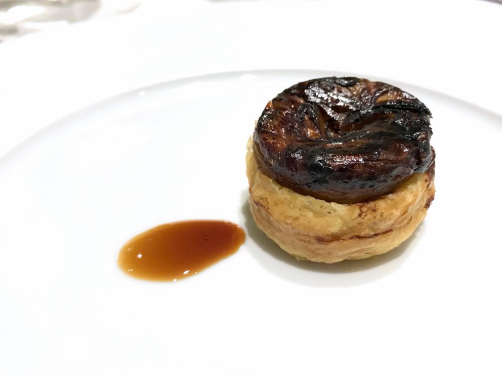 Photogallery






Water, oil, lemon and liquorice: purity. «I use it to clean the palate before the tasting. Water is energy, liquorice is synergic strength, lemon is my emblem, oil [chilled at -40°C] is my homeland»









Italy is also about bread. Taglienti makes it himself, with a 200-year-old mother yeast. On the small plate, at least two delicious types: whole wheat bread, to the right, and schiacciata with herbs and courgette flowers and dehydrated citrus fruits









A dish that, within this new tasting menu, represents something different, that is to say a hint to what the chef has done so far: Bianco e nero di seppia was born in 2009: «The input was a dish of spaghetti with squid ink I had on the beach in Sicily». Under the squid, pressed as if it were pasta, eight types of citrus fruits and panna cotta with sea urchins. Extracts, fonds and jus are increasingly essential in the cuisine of Taglienti. Through them, he channels the essence of flavour: «We always have 12 sauces in the kitchen: fonds of every possible meat, 6 juices from every citrus fruit, plus extracts». The photo shows a previous dinner we had. The author is Tanio Liotta









«I asked myself, why not serve saltimbocca alla romana?». Here it is: raw Piedmontese meat, culatello, butter emulsified with a little flour, thus adding a classic saltimbocca element, then an extract of sage and white wine – the sage is previously micro-fermented close to the stove. «In France cuisine is only about fine dining. In Italy, cuisine comprises everything». Taglienti uses the word vision for this dish









Fat goose liver from Mortara wrapped in steamed cabbage, warm oyster cream and casseoula sauce: the expression of a territory. «This is my idea of casseoula, which we cook in a classic way, and then extract so as to make a sauce». The cabbage recalls caponet or lattuga ripiena alla ligure (served with tocco, a thick meat broth which we’ll mention later too), but has fat liver too. A fantastic dish









Traditional Lasagne Bolognese: (new) avant-garde. A very thin dough, with the ragù simmering for six hours









Frittura di pesce morone al salmoriglio: heritage. «Here’s salmoriglio [not in the photo] an ancient Sicilian and Calabrian seasoning that is more and more forgotten and was one used for chargrilled fish» (olive oil, garlic, oregano, lemon juice, basil, fresh hot green chilli pepper). The batter is made with beer and encloses the fried fish as well as a sauce that is halfway between Provencal anchoiade, with anchovies, and Ligurian tapenade, with olives. Then, also fried in batter, a leaf of basil from the south, «because it’s large, while the basil from Prà in Liguria has small leaves» and then bergamot, Moroccan preserved lemon, olives form Arma di Taggia. Very good









Quintessenza di un tocco genovese: culinary memories. We’ve already mentioned tocco: it’s a sauce based on the very slow cooking of vegetables, tomatoes, mushrooms, bone marrow and then the meat you add so it releases its juices and flavours, and is served separately as a main course. Tocco is a concentrate of aromas that stays in the background. It’s a seasoning, usually, but Taglienti serves it by itself. An elegant blast of flavour






