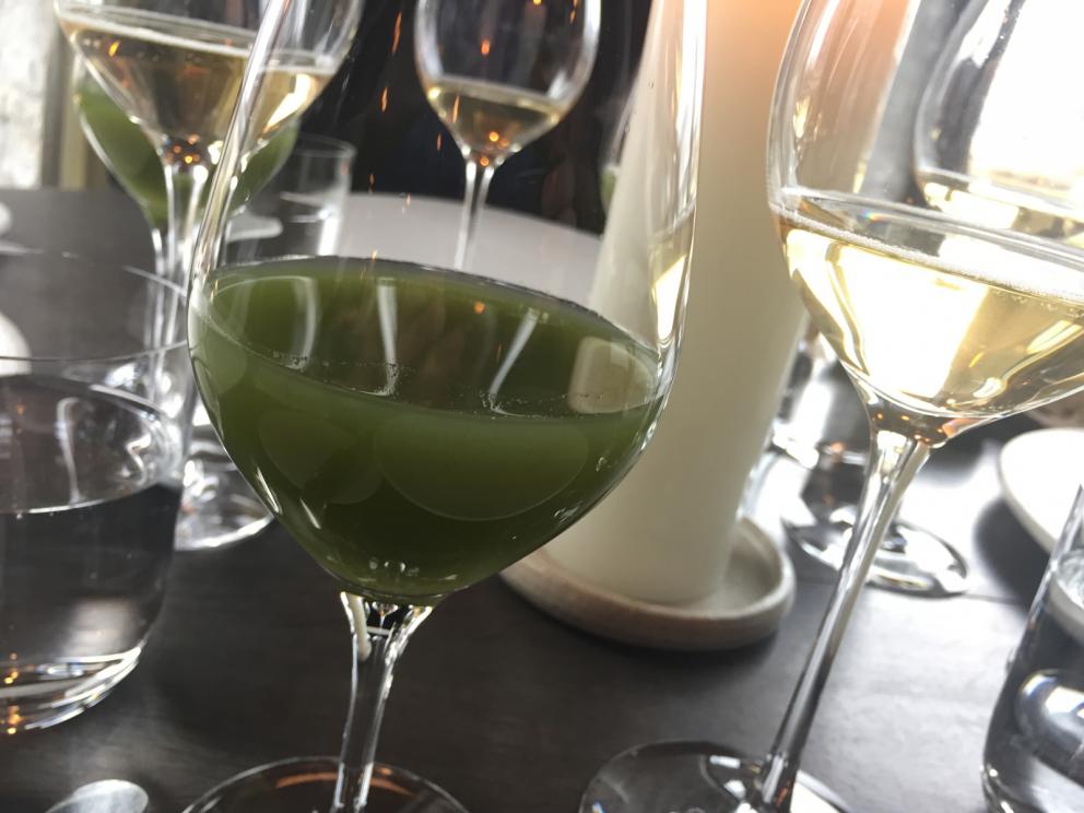 Photogallery






The traditional welcome at Noma: the chefs from the service kitchen greet the guests. In the middle, Italian Riccardo Canella, who will help us describing the last menu in detail (photo gallery by Luca Iaccarino and Gabriele Zanatta)









Warm broth of cloudberries. It’s the last welcome dish at Noma. It’s cold outside but as soon as you sit inside, you get warm thanks to this hot broth made with cloudberries enriched with rhubarb root oil. You dip a bouquet of hay, lemon thyme and mountain pine. Corroborating









Riccardo Canella brings a preview of what will follow









It’s a dish with seafood, including a huge (and alive) king crab, sea urchins and oysters









Apple of the season









Apple of the season. Once you open the shell, many small apple parisienne appear in a juice made with centrifuged, clarified apple scraps, seasoned with verbena and thyme. There’s also a purée of apples fermented in broth. The dish is finished with oxalis flowers, tagete and oil of blackcurrant wood, made by beating the blackcurrant branches with a hammer, so as to extract their essential oils. A very pleasant dish despite its complex idea.

"The first time I saw it ", added Canella, "I was struck because it reminded me of the stuffed apples they used to make at restaurant Bulesca in Selvazzano, Padua, in the early Eighties. Except in that case it was filled with rolls made with granny smith apple and prosciutto from Montagnana" 









Fresh sliced scallop. It’s a scallop taken from the fish tank and shelled a few moments before serving it. It is then sliced, brushed with a reduction of vegetable whipped butter with cucumber centrifuge juice, then reduced, and piso broth (that is to say miso with dehydrated peas).

The technique is the same used for the broth ice-clarification made famous in the Nineties by Heston Blumenthal at Fat Duck: you freeze the broth then hang a table cloth so as to obtain the “pure” part of the liquid. A trick that adds the same satisfying sensation of a meat jus to a vegetable broth. The scallop is finally dipped into a classic mussel broth. An incredible mouthful of seafood and umami









A Winter Platter. Hidden among the leaves, are four edible tastings









He sums up in just one dish 4 snacks that he might would have served separately a few years back. A fun and tasty idea. In detail:

At 6 o’clock: Pear pressed in fermented red gooseberry with fully ripe common sea buckthorn. It’s a rather tart ensemble made sweeter by piso (again miso made with dried peas) seasoned with coriander seeds (supplied by Redzepi’s historic supplier Soren Wiuff). The external thinner leaf is a peel made with chicken broth and beech leaves preserved in vinegar.

10 o'clock: crispy black currant leaf-shaped sandwich, seasoned with yogurt, kombucha, elderberry flowers and red oxalis 

12 o'clock: malt branch with nasturtium leaves, creme fraiche, salt aromatised with pine and ants

4 o'clock: black garlic leaf with salt aromatised with kelp, a Japanese seaweed 









A detail of the malt branch, with well visible ants. At Noma, the study of the aromatic contribution given by formic acid to dishes continues. And even the service acquires elegance: in the past you might have seen ants floating in a few dishes. This is no longer the case









A Tupperware from the "ant library", on the first floor at Strangade









Radish pie. It’s an emblem of the latest menus at Noma. It’s been in the menu for almost a year. In the crunchy disc on the bottom there’s kelp seaweed and a vegetable reduction made with coriander pesto. The radish roses (22, no more, no less) were pressed in beetroot juice. Another formidable tasting









Interns roll the radish roses together, on the top floor at Noma. Loud music and teamwork help making the job less alienating









Natural fermented bread of Øland wheat and hulless barley.  Øland wheat is Danish, with 83% hydration. “Nerd” bread maker Rasmus Kristensen is obsessed with it: even though it could last a week, he bakes it fresh every day for the two services (see the interview on Vice). It has a crispy yet soft crust, and it’s a great progress compared to the early bread making at the restaurant.

The salted butter is instead Norwegian Røros, according to some “the best butter in the world”. One of the most extraordinary pairings ever tasted. We asked for an encore









Cooked oyster and broccoli stems. The oyster is blanched for two minutes and placed on a shell with the edges powdered with salicornia. Between the broccoli and the oyster there are some diced stalks of sorrel. There’s a reduction with kelp seaweed, whisked with butter, thyme and “capers” made with white currants [they’re not real capers but the currants are preserved for a year in 2% salt, like capers). The sauce for the oyster is made with white gooseberries. An artwork, but less convincing than the other tastings









Sea urchin and cabbage. It’s a cabbage leaf pressed with hazelnut oil, filled with sea urchin roe and seasoned with pine vinegar, water from fermented porcini and pickled chanterelle mushrooms. On top, there’s parsley pesto and salt aromatised with pine. It’s a dish that changes greatly according to the season: compared to September, the leaves are now smaller and woodier. Two extraordinary mouthfuls, the result of a rather simple intuition









Sea urchin and cabbage, a detail. Northern sea urchins are creamier than Italian ones. A blast









Langoustine, onion and lavender. The langoustine is the precious one from the Far Oer Islands. The onion is Danish and grilled, steamed in a vacuum bag with Koji oil (blended rapeseed oil with fermented oil) and then grilled again, only slightly, so as to get a golden nuance. The langoustine is instead cooked in its shell, seared in butter at 60°C for 2 minutes, then peeled, cut and served. Rose oil, vinegar made with lovage sprouts and dried lavender complete the picture. The dish is focused on the sweetness given by the onion, which has a similar texture to the langoustine. Very nice









Butternut squash, barley and caviar. The butternut squash is confit in oil aromatised with seaweeds later roasted and placed on top. It is completed with beechnuts, a sauce made with fermented barley and butter and a handful of Finnish caviar. A sweet interlude









Claws and heads of a langoustine from the Far Oer Islands, cut in two. The heads of the langoustine are braised with a paste made with the entrails of the langoustine and a reduction of yeast and thyme and lemon on top. A very pleasing neo-primitive tasting with a strong dose of umami









Steamed king crab and egg yolk sauce. A new take on a classic Japanese dish, learnt in Tokyo and applied in Australia to a snow crab. Global nomadism made Redzepi’s cuisine rounder, less extreme than in the past









In this case, the king crab is steamed and seasoned with smoked salt. The sauce is made with egg yolks marinated in beef garum, a trick that gives a significant sour component to the recipe. Finally, there’s a seasoning made of butter and piso. An interesting depth









Charred greens with a scallop paste. There are plenty of seasonal herbs and vegetables, in this case cabbage, black cabbage, sage, verbena, nettle and the first sprouts of wild garlic. The caramel is made with a purée of fresh scallop, rolled out for 48 hours on a silpat. Once dehydrated, it becomes dark orange. They then blend it, powder it, mix it with bees’ wax and rapeseed oil. Finally they cover the caramel with horseradish juice. Another interlocutory tasting, fun and very much appreciated thanks to the crispiness and the bitter-sweet herbs. Trivia fact: the dish is served with a steak knife. That is to say: herb is the new meat









Roasted Bone Marrow. It’s not the first time they serve grilled bone marrow at Noma, legitimised in fine dining by English Fergus Henderson. What’s new is the way in which they have been serving it in Copenhagen for around one month now: the bone marrow is surrounded by many small plates and garnishes, so guests can enrich it to their liking. A similar idea to what Paolo Lopriore does every day at Portico in Appiano Gentile

 














Among the garnishes that can enrich the bone marrow are pickles, wild mushrooms with beef garum paste, wild herb paste, fresh garlic, leek flower sprouts preserved in salt and salt aromatised with roasted seaweed









Other complements for the bone marrow: to the right, chicken "skin" made with dehydrated jus ("the skin is the best part of a chicken", once Redzepi demonstrated in Belgium) and next to it a vegetal reduction with black garlic









The slices of truffle from Gotland (Sweden) paired with bone marrow are not as strong as those we’re used to. This is why at Noma they add oil aromatised with porcini, aged Danish whiskey and a garum made with Dryad's seddle mushrooms, with a delicate pineapple scent









A dessert of potatoes and plums. Another great emblem of the most recent offer at Noma. Three creams stand out on a sauce of juice and plum aquavit: right to left, a compote of plums (dehydrated in the oven so as to concentrate their aroma), a purée of sweet Danish potatoes and a cream seasoned with plum nuts, which surprisingly recall almonds









Black currant wood ice cream and roasted konini. Also known as "No-Magnum", Noma’s Magnum, unites konini [an ancient Swedish wheat] roasted like coffee, oxalis, a reduction of quince syrup and a few leaves of verbena. Every day the guys sharpen some 200 branches of black currants









Moss cooked in white chocolate. It’s the sweet version of the famous Moss and Cep, a “savoury” dish from the early days. It’s fried musk covered in white chocolate. Next to it, a disc covered in chocolate with powdered liquorice on top (even Redzepi had to surrender to the exotic deliciousness of cocoa)






