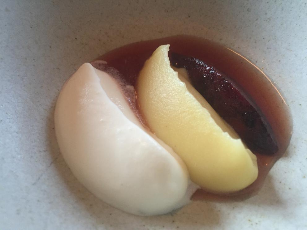 Photogallery






The traditional welcome at Noma: the chefs from the service kitchen greet the guests. In the middle, Italian Riccardo Canella, who will help us describing the last menu in detail (photo gallery by Luca Iaccarino and Gabriele Zanatta)









Warm broth of cloudberries. It’s the last welcome dish at Noma. It’s cold outside but as soon as you sit inside, you get warm thanks to this hot broth made with cloudberries enriched with rhubarb root oil. You dip a bouquet of hay, lemon thyme and mountain pine. Corroborating









Riccardo Canella brings a preview of what will follow









It’s a dish with seafood, including a huge (and alive) king crab, sea urchins and oysters









Apple of the season









Apple of the season. Once you open the shell, many small apple parisienne appear in a juice made with centrifuged, clarified apple scraps, seasoned with verbena and thyme. There’s also a purée of apples fermented in broth. The dish is finished with oxalis flowers, tagete and oil of blackcurrant wood, made by beating the blackcurrant branches with a hammer, so as to extract their essential oils. A very pleasant dish despite its complex idea.

"The first time I saw it ", added Canella, "I was struck because it reminded me of the stuffed apples they used to make at restaurant Bulesca in Selvazzano, Padua, in the early Eighties. Except in that case it was filled with rolls made with granny smith apple and prosciutto from Montagnana" 









Fresh sliced scallop. It’s a scallop taken from the fish tank and shelled a few moments before serving it. It is then sliced, brushed with a reduction of vegetable whipped butter with cucumber centrifuge juice, then reduced, and piso broth (that is to say miso with dehydrated peas).

The technique is the same used for the broth ice-clarification made famous in the Nineties by Heston Blumenthal at Fat Duck: you freeze the broth then hang a table cloth so as to obtain the “pure” part of the liquid. A trick that adds the same satisfying sensation of a meat jus to a vegetable broth. The scallop is finally dipped into a classic mussel broth. An incredible mouthful of seafood and umami









A Winter Platter. Hidden among the leaves, are four edible tastings









He sums up in just one dish 4 snacks that he might would have served separately a few years back. A fun and tasty idea. In detail:

At 6 o’clock: Pear pressed in fermented red gooseberry with fully ripe common sea buckthorn. It’s a rather tart ensemble made sweeter by piso (again miso made with dried peas) seasoned with coriander seeds (supplied by Redzepi’s historic supplier Soren Wiuff). The external thinner leaf is a peel made with chicken broth and beech leaves preserved in vinegar.

10 o'clock: crispy black currant leaf-shaped sandwich, seasoned with yogurt, kombucha, elderberry flowers and red oxalis 

12 o'clock: malt branch with nasturtium leaves, creme fraiche, salt aromatised with pine and ants

4 o'clock: black garlic leaf with salt aromatised with kelp, a Japanese seaweed 









A detail of the malt branch, with well visible ants. At Noma, the study of the aromatic contribution given by formic acid to dishes continues. And even the service acquires elegance: in the past you might have seen ants floating in a few dishes. This is no longer the case









A Tupperware from the "ant library", on the first floor at Strangade









Radish pie. It’s an emblem of the latest menus at Noma. It’s been in the menu for almost a year. In the crunchy disc on the bottom there’s kelp seaweed and a vegetable reduction made with coriander pesto. The radish roses (22, no more, no less) were pressed in beetroot juice. Another formidable tasting









Interns roll the radish roses together, on the top floor at Noma. Loud music and teamwork help making the job less alienating









Natural fermented bread of Øland wheat and hulless barley.  Øland wheat is Danish, with 83% hydration. “Nerd” bread maker Rasmus Kristensen is obsessed with it: even though it could last a week, he bakes it fresh every day for the two services (see the interview on Vice). It has a crispy yet soft crust, and it’s a great progress compared to the early bread making at the restaurant.

The salted butter is instead Norwegian Røros, according to some “the best butter in the world”. One of the most extraordinary pairings ever tasted. We asked for an encore









Cooked oyster and broccoli stems. The oyster is blanched for two minutes and placed on a shell with the edges powdered with salicornia. Between the broccoli and the oyster there are some diced stalks of sorrel. There’s a reduction with kelp seaweed, whisked with butter, thyme and “capers” made with white currants [they’re not real capers but the currants are preserved for a year in 2% salt, like capers). The sauce for the oyster is made with white gooseberries. An artwork, but less convincing than the other tastings









Sea urchin and cabbage. It’s a cabbage leaf pressed with hazelnut oil, filled with sea urchin roe and seasoned with pine vinegar, water from fermented porcini and pickled chanterelle mushrooms. On top, there’s parsley pesto and salt aromatised with pine. It’s a dish that changes greatly according to the season: compared to September, the leaves are now smaller and woodier. Two extraordinary mouthfuls, the result of a rather simple intuition









Sea urchin and cabbage, a detail. Northern sea urchins are creamier than Italian ones. A blast









Langoustine, onion and lavender. The langoustine is the precious one from the Far Oer Islands. The onion is Danish and grilled, steamed in a vacuum bag with Koji oil (blended rapeseed oil with fermented oil) and then grilled again, only slightly, so as to get a golden nuance. The langoustine is instead cooked in its shell, seared in butter at 60°C for 2 minutes, then peeled, cut and served. Rose oil, vinegar made with lovage sprouts and dried lavender complete the picture. The dish is focused on the sweetness given by the onion, which has a similar texture to the langoustine. Very nice









Butternut squash, barley and caviar. The butternut squash is confit in oil aromatised with seaweeds later roasted and placed on top. It is completed with beechnuts, a sauce made with fermented barley and butter and a handful of Finnish caviar. A sweet interlude









Claws and heads of a langoustine from the Far Oer Islands, cut in two. The heads of the langoustine are braised with a paste made with the entrails of the langoustine and a reduction of yeast and thyme and lemon on top. A very pleasing neo-primitive tasting with a strong dose of umami









Steamed king crab and egg yolk sauce. A new take on a classic Japanese dish, learnt in Tokyo and applied in Australia to a snow crab. Global nomadism made Redzepi’s cuisine rounder, less extreme than in the past









In this case, the king crab is steamed and seasoned with smoked salt. The sauce is made with egg yolks marinated in beef garum, a trick that gives a significant sour component to the recipe. Finally, there’s a seasoning made of butter and piso. An interesting depth









Charred greens with a scallop paste. There are plenty of seasonal herbs and vegetables, in this case cabbage, black cabbage, sage, verbena, nettle and the first sprouts of wild garlic. The caramel is made with a purée of fresh scallop, rolled out for 48 hours on a silpat. Once dehydrated, it becomes dark orange. They then blend it, powder it, mix it with bees’ wax and rapeseed oil. Finally they cover the caramel with horseradish juice. Another interlocutory tasting, fun and very much appreciated thanks to the crispiness and the bitter-sweet herbs. Trivia fact: the dish is served with a steak knife. That is to say: herb is the new meat









Roasted Bone Marrow. It’s not the first time they serve grilled bone marrow at Noma, legitimised in fine dining by English Fergus Henderson. What’s new is the way in which they have been serving it in Copenhagen for around one month now: the bone marrow is surrounded by many small plates and garnishes, so guests can enrich it to their liking. A similar idea to what Paolo Lopriore does every day at Portico in Appiano Gentile

 














Among the garnishes that can enrich the bone marrow are pickles, wild mushrooms with beef garum paste, wild herb paste, fresh garlic, leek flower sprouts preserved in salt and salt aromatised with roasted seaweed









Other complements for the bone marrow: to the right, chicken "skin" made with dehydrated jus ("the skin is the best part of a chicken", once Redzepi demonstrated in Belgium) and next to it a vegetal reduction with black garlic









The slices of truffle from Gotland (Sweden) paired with bone marrow are not as strong as those we’re used to. This is why at Noma they add oil aromatised with porcini, aged Danish whiskey and a garum made with Dryad's seddle mushrooms, with a delicate pineapple scent






