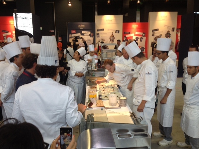 Photogallery






The S.Pellegrino Young Chef takes place in the basement of the Mall, under the Diamond Tower in via Liberazione, Milan








The kitchen area dedicated to the preparation is huge








Outdoor finishes








The twenty candidates competing in the S.Pellegrino Young Chef before the start








River, land, earth, the dish by Swiss Martin Elschner













The Swiss candidate Martin Elschner








Second from the left, Italian candidate Paolo Griffa








MENTORS. Nino Graziano, two Michelin stars in Sicily in the past, now at work in Moscow; Norwegian Eyvind Hellstrøm, the first two stars in Scandinavia (Bagatelle in Oslo, now closed) and Yoshihiro Narisawa (eighth in the World's 50Best)








The dish by American Vinson Petrillo: Squid, chorizo, agnolotti with wagyu cheeks and parsley, emulsion of squid ink








The S.Pellegrino Young chef is fashion too: some of the collections beside the ring with the chefs








The complete jury








Wylie Dufresne, a legend in creative cuisine in America, with stylist A-Morir competing for the same country








Maria José Jordan from Peru, the only woman in the competition 





