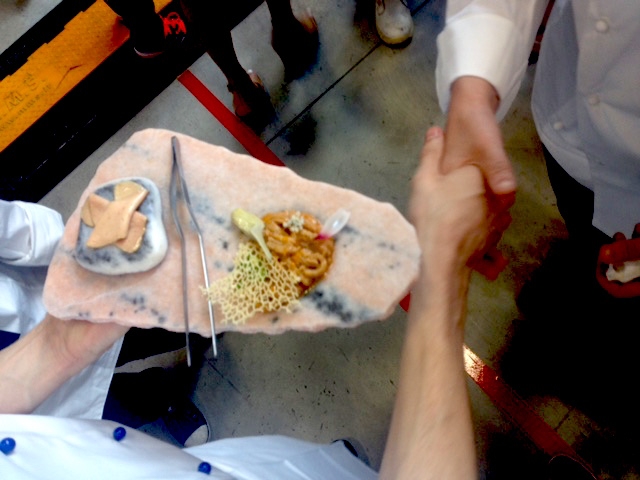 Photogallery






The S.Pellegrino Young Chef takes place in the basement of the Mall, under the Diamond Tower in via Liberazione, Milan








The kitchen area dedicated to the preparation is huge








Outdoor finishes








The twenty candidates competing in the S.Pellegrino Young Chef before the start








River, land, earth, the dish by Swiss Martin Elschner













The Swiss candidate Martin Elschner








Second from the left, Italian candidate Paolo Griffa








MENTORS. Nino Graziano, two Michelin stars in Sicily in the past, now at work in Moscow; Norwegian Eyvind Hellstrøm, the first two stars in Scandinavia (Bagatelle in Oslo, now closed) and Yoshihiro Narisawa (eighth in the World's 50Best)








The dish by American Vinson Petrillo: Squid, chorizo, agnolotti with wagyu cheeks and parsley, emulsion of squid ink








The S.Pellegrino Young chef is fashion too: some of the collections beside the ring with the chefs








The complete jury








Wylie Dufresne, a legend in creative cuisine in America, with stylist A-Morir competing for the same country








Maria José Jordan from Peru, the only woman in the competition 













Unusual dishes








Massimo Bottura and journalist Ryan King of Fine Dining Lovers








Angel Leon of restaurant Aponiente in Andalusia, mentor of the Spanish candidate, with Joan Roca, chef number one in the world according to the World's 50Best, at the helm of Celler de Can Roca in Cataluña








<p><b>Griffa</b> waits patiently for his turn (he will be the 17th of the 20 contenders) spying the work of those who come before him</p>








Irish Mark Moriarty at work (The Culinary Counter, Dublin)








The dish by David Andreas Morera, Spain-Portugal, Smoked roasted eel, onion soup, Hollandaise sauce and pickled onions 








Morarty’s dish: Celeriac baked in barley and smoked hay  























The great Japanese chef Seiji Yamamoto, Japanese mentor, at the helm of restaurant Ryugin 








Dany Stauffacher, organiser of Sapori Ticino, takes a selfie with Cristina Bowerman and Paolo Griffa








The Italian team supporting Paolo Griffa





