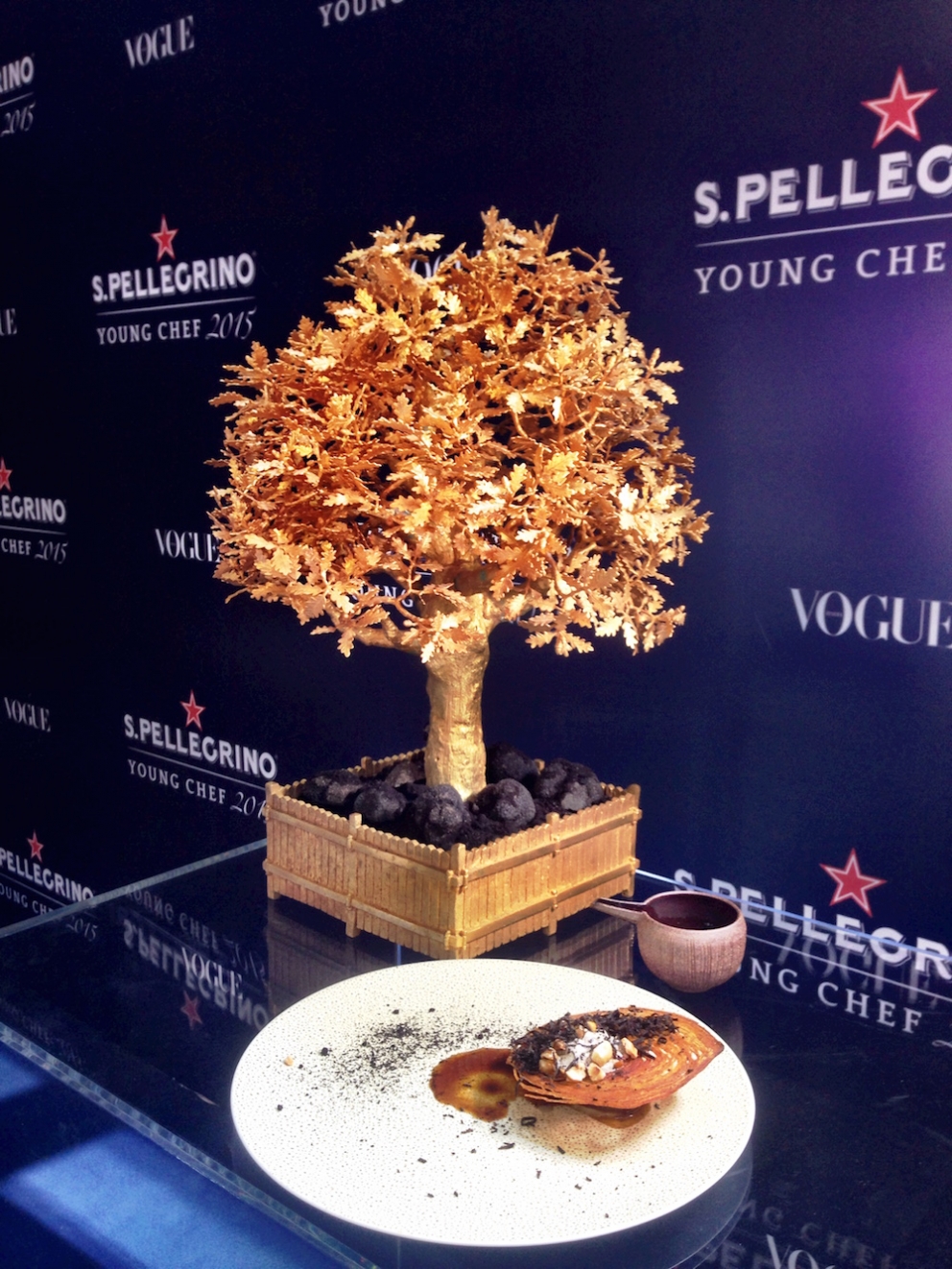 Photogallery






The S.Pellegrino Young Chef takes place in the basement of the Mall, under the Diamond Tower in via Liberazione, Milan








The kitchen area dedicated to the preparation is huge








Outdoor finishes








The twenty candidates competing in the S.Pellegrino Young Chef before the start








River, land, earth, the dish by Swiss Martin Elschner













The Swiss candidate Martin Elschner








Second from the left, Italian candidate Paolo Griffa








MENTORS. Nino Graziano, two Michelin stars in Sicily in the past, now at work in Moscow; Norwegian Eyvind Hellstrøm, the first two stars in Scandinavia (Bagatelle in Oslo, now closed) and Yoshihiro Narisawa (eighth in the World's 50Best)








The dish by American Vinson Petrillo: Squid, chorizo, agnolotti with wagyu cheeks and parsley, emulsion of squid ink








The S.Pellegrino Young chef is fashion too: some of the collections beside the ring with the chefs








The complete jury








Wylie Dufresne, a legend in creative cuisine in America, with stylist A-Morir competing for the same country








Maria José Jordan from Peru, the only woman in the competition 













Unusual dishes








Massimo Bottura and journalist Ryan King of Fine Dining Lovers








Angel Leon of restaurant Aponiente in Andalusia, mentor of the Spanish candidate, with Joan Roca, chef number one in the world according to the World's 50Best, at the helm of Celler de Can Roca in Cataluña








<p><b>Griffa</b> waits patiently for his turn (he will be the 17th of the 20 contenders) spying the work of those who come before him</p>








Irish Mark Moriarty at work (The Culinary Counter, Dublin)








The dish by David Andreas Morera, Spain-Portugal, Smoked roasted eel, onion soup, Hollandaise sauce and pickled onions 





