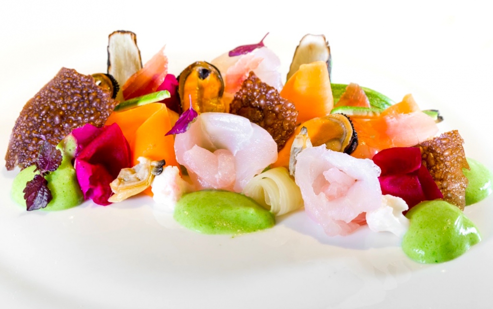 Photogallery






Enrico Crippa, Piazza Duomo, Alba (Cuneo)

Prawn and radicchio from Treviso cocktail – It’s a take on prawn cocktail with radicchio from Treviso first vacuum cooked and then opened as if it were a water lily. The prawn is seasoned with smoked pancetta cooking water. Then prawn bisque and a drop of shiso vinegar. Hence the classic dish acquires a new dimension, seasoned with choron sauce, which is basically a Béarnaise sauce with tomato









Andrea Ribaldone, I Due Buoi, Alessandria

Fassone beef agnolotti – Subtitle: “Memories of a trip to Japan”. Because I unite a true Piedmontese classic with a typical Japanese technique, soba in ice. Hence: cold agnolotti, in ice, with the intensity of the stuffing enhanced by the low temperature. I connect with the territory: not having agnolotti in the menu, in Piedmont, is blasphemy. However, I present them almost crispy. I took the recipe from my aunt, from Lu Monferrato, and remembered when as a child I would eat her agnolotti as soon as she made them, still raw and callous









Riccardo Aiachini, La Fermata, Alessandria

Chicken alla Marengo... – It’s an ancient recipe dedicated to Napoleon after the battle he won against the Austrians in June of 1800. With a contemporary take, of course









Davide Palluda, All’Enoteca, Canale (Cuneo)

Salted codf with milk and onion caramel – A veil of pungent and sweet caramel, with dried onion amplifying its flavour, on top of the salted cod cooked with milk. A sumptuous and intrigating dish, with white and milky tones, connected with my past and the history of many regions that don’t have any sea but have always been dreaming of it when cooking









Marc Lanteri, Al Castello di Grinzane, Grinzane Cavour (Cuneo)

Marco Martini’s Fassone steak tartare, light whole grain mustard mayonnaise and Parmigiano matured 30 months – This dish is a classic from the Langhe, to which I give a touch of France thanks to the light whole grain mustard mayonnaise









Barbara Scabin, Blupum, Ivrea (Torino)

L'isola galleggiante dei cugini d'Oltralpe rivisto al contrario [The floating island of the cousins from the other side of the Alps, seen upside down] – Quoting Wikipedia: it’s a relatively light and moderately sweet dessert, so much so that if prepared with the necessary attention, it can also be eaten by people suffering from diabetes, cardiac and celiac diseases









Marco Rossi, La Mugnaia, Ivrea (Torino)

Testacoda – These are cheeks cooked very slowly, tail wrapped in cabbage and fillet tataki with horseradish. In other ways, it’s Piedmontese fassone from the Langhe to Japan…









Marta Grassi, Tantris, Novara

Prospettiva nord: baccalà e culatello s’incontrano [Looking North, salted cod and culatello meet] – Two elements, two Northern regions, the former sober and simple, the latter opulent, meet and melt









Antonino Cannavacciuolo, Villa Crespi, Orta San Giulio (Novara)

Prawns, egg and tomato – My personal play with marine textures. This fake mini sunny side up egg is my south with earthly aromas such as tomato and inside a tartare of raw prawns. Red prawn from Sicily is still one of my favourite crustaceans, it’s a part of my life (photo credits Viaggiatore Gourmet)









Christian Milone, Trattoria Zappatori, Pinerolo (Torino)

Egg and eggs – Egg yolk with truffle, caviar, celery broth and parsley buttons... with herbs. There’s a world inside, it pulls down prejudgements and popular beliefs having everyone’s taste agree









Christian Meloni Delrio, Casa Baladin, Piozzo (Cuneo)

A cage made with quinoa, scampi and burrata – A simple yet flavourful dish, perfectly matched with our Wayan beer, a saison with scents of pepper









Davide Scabin, Combal.zero, Rivoli (Torino)

Saltimbocca alla Combal.zero – When you see a slice of prosciutto and some sage on top of a slice of meat you know it’s a "saltimbocca alla romana”. As of today, when you see a slice of prosciutto and some sage on a pasta lasagna (the egg-pasta must be at least 4 mm thick), you’ll know it’s a “saltimbocca alla Scabinsky”. The only variation: 3 different prosciuttos are used, one from Piedmont, one from Parma and one from Tuscany (from the great Fracassi)









Igor Macchia, La Credenza, San Mauro Torinese (Torino)

Felicetti Conchiglioni with squid ink, mussels, potatoes, chicory and candied ginger – All the flavour of Italian tradition plus the lightness of the Japanese one









Luca Zecchin, Guido da Costigliole, Santo Stefano Belbo (Cuneo)

Steamed and then roasted duck thigh with Abate pears, honey and pepper from Val di Maggia – A dish that encloses our tradition and connects our borders in Italy









Ugo Alciati, Guido, Serralunga d'Alba

Cardoons pears and anchovies – An unusual and intriguing pairing, the meeting of three Piedmontese ingredients that aren’t normally matched: hunchback cardoons from Nizza Monferrato, Madernassa pear and salted anchovy









Massimiliano Musso, Cà Vittoria, Tigliole d’Asti (Asti)

Rabbit, artichokes, liquorice and vegetal notes – I’m proud of this dish because in Piedmontese tradition roasted rabbit is always present in the Sunday lunch menu. I enriched it with a modern cooking technique (that is to say low temperature), pairing it with artichokes cooked in a vacuum with oil aromatised with toasted and blended peels and a liquorice mayo. Finally herbs, a vegetal touch coming from my kitchen garden









Claudio Vicina, Casa Vicina a Eataly, Torino

Kabuki 2013 – From 2013 onwards, it has undergone many changes. It’s a complete main course in terms of nutrients and calories. It was born as a starter in ancient times (tartrà). It then became more refined, in the shape of a pie, and today it’s a complete vegetarian dish. It’s called Kabuki because of it’s an explosion of colours, vegetables (4 or 5) and flavour. We serve it thus: a pie made with courgettes and Grana Padano matured 24 months in the centre of the dish. Finally, on top of the pie, we carefully put the egg yolk breaded with brioche crumbles fried in extra virgin olive oil









Matteo Baronetto, Del Cambio, Torino

Lasagne with sea lettuce and veal meat sauce (without tomato) – The sea lettuce lasagne is an almost natural and spontaneous version of Gualtiero Marches’s lasagne made with green pasta and pheasant meat sauce which I made again and again. It is natural and spontaneous in that the idea is not of giving a new take on the classic lasagne but a chance to a celiac to taste the primary taste of lasagne. The sea lettuce in fact shows no difference with the classic Italian green coloured pasta









Marcello Trentini, Magorabin, Torino

Puntarelle/Burrata/Anchovies- A delicious and complex snack uniting North and South... Hanging in the balance between bitter, sapid, sweet and umami









Alessandro Mecca, Spazio 7 – Torino

Pork belly, apple, oyster and ear – A journey across strong and delicate flavours, where the tradition of my territory is renewed in the dish by meeting the sea (photo by Edoardo Gatti)









Stefano Borra, Vo, Torino

Jerusalem artichoke cooked in two ways, cardoons au gratin, rabbit meat sauce, white truffle – My bagna caoda, served in a "balon”









Marco Sacco, Piccolo Lago, Verbania

Bottoni di lago – A dish that brings back the memory of the days spent by the lake as a child









Maurizio Macario, Nazionale, Vernante (Cuneo)

Smoked fario trout, its roe, acid curdle and gomasio – A new dish, Occitan-style. The iridea trout from the Maritime Alps is lightly smoked, served in a crispy cannolo (like a savoury version of chiacchiere), slightly sour goat’s and cow’s milk cream, with gomasio adding a sapid note









Christian and Manuel Costardi, Cinzia - Da Christian e Manuel, Vercelli

iNvidia – A sweet by Manuel, who created a new word: "cuocodolce". In his evolution, he’s getting closer and closer to the kitchen and his sweets are becoming real courses. This cake is born from the use of endive as a container for a cream of liquorice, plus almonds and capers









Agostino Buillas, Café Quinson, Morgex (Aosta)

Non di solo fumo... [More than smoke] – The disregarded veal sweetbreads deserve more! Served on a sour cream with chives, herring roe and juniper smoke









Federico Zanasi, Snowflake del Principe delle Nevi, Cervinia (Aosta)

Stewed cabbage, camomile, goat Hollandaise with burnt almonds and white truffle – I’m proud of this dish because I made an undervalued vegetable nobler, and upturned the concept of vegetables as a side dish. In this case the taste of the meat is a side to the vegetable









Serenella Medone, Al Solito Posto, Bogliasco (Genoa)

Black cabbage ravioli with local fish, raw and cooked – When there’s no prebuggiun to make pansoti… These ravioli are made with stewed black cabbage fried with diced local fish and served with raw bonito. The idea is to substitute the mixed wild herbs – which we call prebuggiun – with a seasonal vegetable and transform it into a seafood dish






