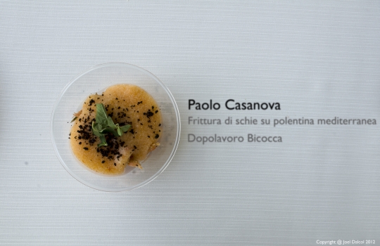 Galleria fotograficaPaolo Casanova, chef padrone di casa del Dopolavoro
Sullo sfondo, il nippo-brasiliano Roberto Okabe, protagonista con i maki in versione rubitt
La Lingua cotta in due modi di Eugenio Roncoroni e Beniamino Nespor del ristorante Al MercatoProve generali della Brass Jazz Band
L'Anguria con quartirolo e menta di Alice Delcourt, chef dell'Erba BruscaDegustazione di rubitt
Acqua Panna e S.Pellegrino e Birra Moretti, sponsor della maratona insieme a Lavazza, Inoxpi&ugrave;, San Bitter e Macelleria Annunciata
Cesare Battisti, il "padre" dei rubitt: al Ratan&agrave;, Battisti propone da sempre le "piccole cose di pregio" all'ora dell'aperitivo
&nbsp;Il Panino con lampredotto in due bocconi: il rubitt &egrave; a firma Roncoroni&Nespor
La Tartare di vitello sanato con bottarga, uova di trota e topinambur croccante di Cesare Battisti. La splendida carne &egrave; della Macelleria Annunciata di Milano
Maratona a suon di jazz
