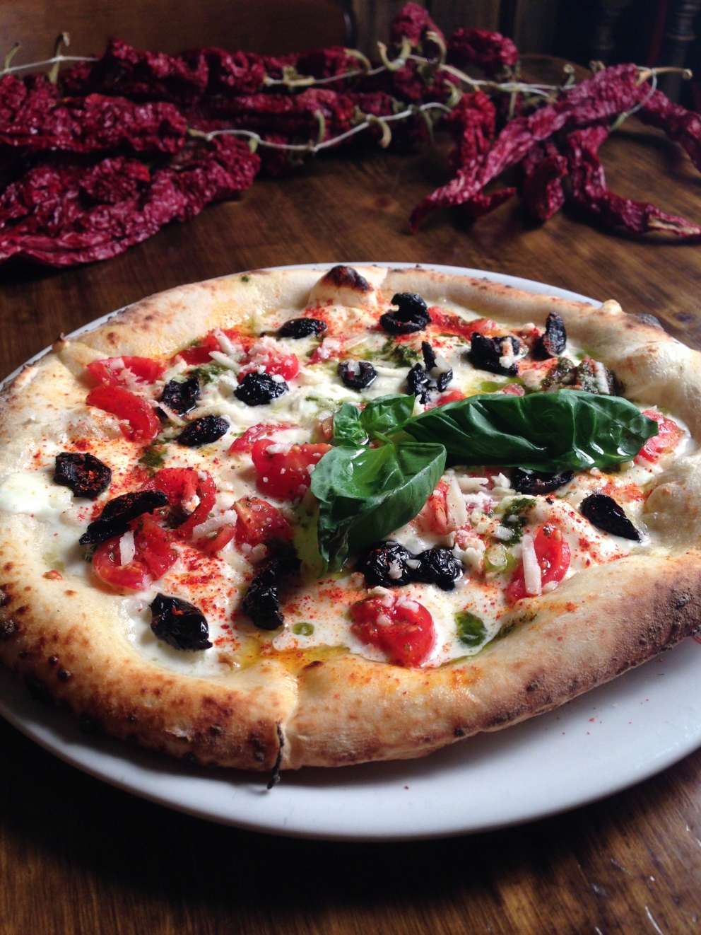 Galleria fotografica






La pizza in teglia farcita con crema di topinambur, soppressata (coppa di testa, quella buonissima made in Toscana di Renieri) e scorza di limone di Graziano Monogrammi, La Divina Pizza a Firenze









Una passeggiata al ghetto, pizza tonda con alici affumicate, scarola riccia, pomodorini e panko di Pier Daniele Seu al Gazometro38









La Margherita Romanesca con pomodoro, “mozzarella” di pecora, pecorino romano e menta di Stefano Callegari e Valerio Piccirillo da Sbanco a Roma









La pizza a 4 mani con Davide Del Duca di Francesco Martucci de I Masanielli









La pizza Vegetariana d’Autunno di ‘O Fiore Mio a Faenza









La pizza con crema di zucchine, dadolata di pomodoro e gamberi crudi di Massimo Giovannini all’Apogeo di Pietrasanta









La pizza in teglia con pancetta porchettata e ricotta della Garfagnana di Andrea Morini della pizzeria Da Cecio, con lo strepitoso impasto di Gabriele Bonci









La pizza con burrata, alici, nocciole e timo di Enrico Cappuccini e Carmine Piano, alias PizzeVaganti









La Pizza del territorio (in edizione limitata) di Franco Pepe fatta solo con prodotti dell’Alto Casertano









La pizza maritata di Angelo Rumolo da Grotto Pizzeria Castello a Caggiano









La Pizza Crocché con fiordilatte dei monti Lattari e crocché di patate di Peppe Guida: una squisita pizza a 4 mani con Giancarlo Casa alla Gatta Mangiona (foto Lorenzo Sandano)









La pizza “da compartir” di Madre a Roma (leggi qui), in particolare l’Affumicata con provola affumicata, patate e chorizo









La pizza fritta di Ciro Oliva da Concettina ai Tre Santi con ricotta, pepe e scorza di limone









La pizza alla pala – versione basic della Margherita con pomodorini freschi e mozzarella di bufala a crudo – di Ribalta a New York, il locale di Rosario Procino e Pasquale Cozzolino









La Pizz’a Selva del Foro dei Baroni a Puglianello (Benevento) con asparagi, fiordilatte, lonzardo, provolone del Monaco e menta. Non solo la cucina di Raffaele D’Addio ma anche un’ottima pizza!









Il Doppio Crunch con crema di senape di Dijon e caprottino della Lessinia, tartare di GrassFed e olio extravergine delle colline di Mezzane di Renato Bosco









Le ‘mpustarelle di Enzo Coccia ed Eduardo Ore da ‘O Sfizio d’’a Notizia a Napoli, ad esempio quella con crema di zucca, provola, funghi di stagione e salsiccia di bufalo






