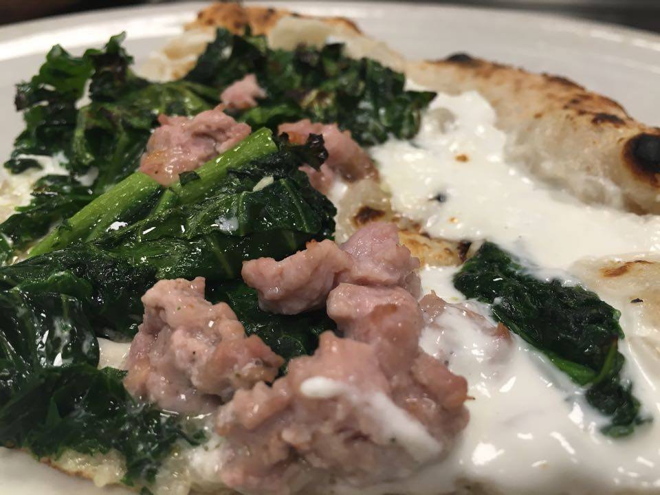 Galleria fotografica






Patrick Ricci, Pomodoro & Basilico, San Mauro Torinese (Torino)

Emozioni - Foie gras con criollo 100%, mostarda di fichi e mousse al caffè. Sottotitolo, l'amore in un morso. Resta in bocca un gusto finale di amaro e dolce, è un po' la sensazione che si prova quando si vive un amore, ma nei momenti un po' tristi, dopo una lite o quando non è corrisposto – foto Luca Appiotti









Simone Lombardi, Dry, Milano

Pizza anguilla al cartoccio, cime di rapa e provola affumicata - Un piatto dalla prevalente nota affumicata data dalla cottura dell’anguilla nel forno a legna. Le cime di rapa ne risaltano: sapidità, grassezza e tendenza amarognola









Leonardo Giannico, Taverna Gourmet, Milano

Pizza polipo e cime di rapa, impasto al nero di seppia – Con vellutata di broccoli calabresi cime di rapa e polipo alla plancia, il tutto accompagnato da un bicchierino di acqua di polipo, lime e pepe nero, per sciacquare la bocca e accompagnare la pizza









Antonio Pappalardo, La Cascina dei Sapori, Rezzato (Brescia)

Pizza da degustazione con tagliatelle di seppia, caco, noce macadamia e frutto della passione - L'abbiamo proposta in anteprima per la serata di beneficienza che abbiamo organizzato a favore della fondazione PInAC ed è piaciuta molto. L'ho creata insieme al mio secondo Matteo Attianese, perché abbiamo visto che in precedenza abbiamo proposto la seppia in alcune pizze ma sempre con poco successo. Quindi cambiando forma alla seppia (prima cotta sottovuoto e poi tagliata con l'affettatrice a mó di tagliatella) ho notato che è stata molto apprezzata









Denis Lovatel, Da Ezio, Alano di Piave (Belluno)

In-fusioni - La pizza inaugura un progetto al quale tengo molto, prevede la creazione di 12 pizze d'autore ideate insieme ad altrettanti importanti chef. Ne proporremo una al mese qui Da Ezio. Questo mese partiamo con una pizza creata insieme a Francesco Brutto di Undicesimo Vineria, premiato di recente come Miglior Chef Emergente del Nordest. Insieme abbiamo pensato una pizza bianca con fiordilatte, topinambur al forno, chips di cavolo nero, succo di cavolo nero, noci e infuso di Pu'er, un particolare tè post-fermentato cinese della regione della Yunnan, che più invecchia e più migliora. Sulla pizza usiamo un Pu'er del 1998 con sentori di noce, cantina, terra e corteccia. In generale è una pizza che gioca sull'armonia e non sui contrasti, i gusti si richiamano a vicenda









Alberto Morello, Gigi Pipa, Este (Padova)

Gennaio nell'orto - La verdura è ovviamente di nostra produzione (broccolo verde, finocchio con aneto, cipolla caramellata, spuma di spinaci e parmigiano, chips di broccolo fiolaro)









Ruggero Ravagnan, Grigoris, Mestre (Venezia)

Cavolo che sarda! - Fiordilatte, cavolo nero, sarda al forno, peperoncino fresco, pane croccante di Petra9, finocchietto









Simone Padoan, I Tigli, San Bonifacio (Verona)

Pizza raperonzoli e pasta di salame - Perché per me è la perfetta trasposizione di ricordi di infanzia in un piatto moderno, capace di attualizzare sapori tradizionali tipici di questo periodo









Renato Bosco, Saporè, San Martino Buon Albergo (Verona)

Aria Affumicata - Aria di pane cotta al vapore con renga affumicata e con crema calda di broccoletto di Custoza. Tradizioni e usanze della cucina veronese vogliono essere riportate in chiave attuale presentando un piatto che si troverà a Saporè nel periodo quaresimale. In molti paesi del Veronese si festeggia la renga (pesce povero) in concomitanza con il mercoledì delle ceneri. Sacro e profano si mescolano









Matto Aloe, Berberè, Bologna (anche Castelmaggiore e Firenze)

Pizza 'nduja di Spilinga, pomodoro, caciocavallo. Una pizza che ha preso posto nei menu di tutte le stagioni in Berberè. Un'evergreen caldo, deciso e accogliente: una pizza del sud









Massimo Gatti, I Due Gatti, Borgo Val di Taro (Parma)

Pizza Don Camillo. E' una delle pizze che comporrà il menu della nuova pizzeria al taglio Pizza di Parma, in posizione centralissima a Parma (apertura entro marzo) che proporremo lungo l'anno con cadenza mensile, per giocare anche con prodotti fuori del nostro territorio in maniera accattivante. E' ispirata alle scorribande e ai luoghi del personaggio di Guareschi: spalla cotta di San Secondo, la crema di Parmigiano-Reggiano (tratto d'unione tra le due province) e le cipolline Borettane (Boretto è un paese nei pressi di Brescello, dove venne sviluppata la storia di Don Camillo) cotte nella Fortana, vino tipico della Bassa Parmense e Reggiana 









Gabriele Bonci, Pizzarium, Roma

Pizza carbonara di carciofi. Una focaccia di cipolle dolci, con sopra una strapazzata di uovo, guanciale e pecorino. Rifinita con qualche carciofo, alla giudia e alla romana. L'ho dedicata a tutte quelle persone che ogni giorno vengono da tutto il mondo per assaggiare la mia pizza. Un boccone di romanità all'ennesima potenza









Stefano Callegari, Sforno, Roma

Bruschetta culo e camicia. Fetta di pane tostato con un velo di burro Occelli, uovo Parisi in camicia e una fetta di culatello Spigaroli sopra. La presenterò da Sbanco, il mio nuovo locale, apertura marzo 2016









Franco Pepe, Pepe in Grani, Caiazzo (Caserta)

Pizza Bucolica. L'ispirazione nasce da un'antica ricetta campana. Alla zucca ed ai fagioli si uniscono il sapore deciso della scamorza affumicata e la nota croccante del radicchio









Ciro Salvo, 50 Kalò, Napoli

50 Kalò (Margherita con scarole). Ingredienti: pomodorini datterini freschi, scarole cotte a vapore, fior di latte di Agerola, olive nere taggiasche, capperi di Salina azienda agrobiologica Salvatore D'Amico, olio extra vergine d'oliva Dop colline salernitane









Enzo Coccia, La Notizia 94, Napoli

Pizza Guardia Costiera. E' una pizza nata in nome della solidarietà per gli uomini e donne della guardia costiera che ogni anno salvano migliaia di vite (profughi). Include mozzarella di bufala, tonno affumicato tagliato sottile, erba cipollina, olio aromatizzao al limone, origano e basilico. Abbinamento consigliato: champagne Jacquesson 738









Gino Sorbillo, Sorbillo, Napoli e Milano

La pizza dell'Alleanza Slow Food. L'incontro di 3 differenti Presidi Slow Food della Campania sulla classica pizza della tradizione napoletana: Pomodoro San Marzano Dop, Salciccia Rossa di Castelpoto e Cacioricotta di Capra Cilentana. Impasto di farina biologica integrale e biologica tipo 0, fiordilatte de Il Casolare di Alvignano; extravergine biologico di Terre Francescane. Cottura a legna






