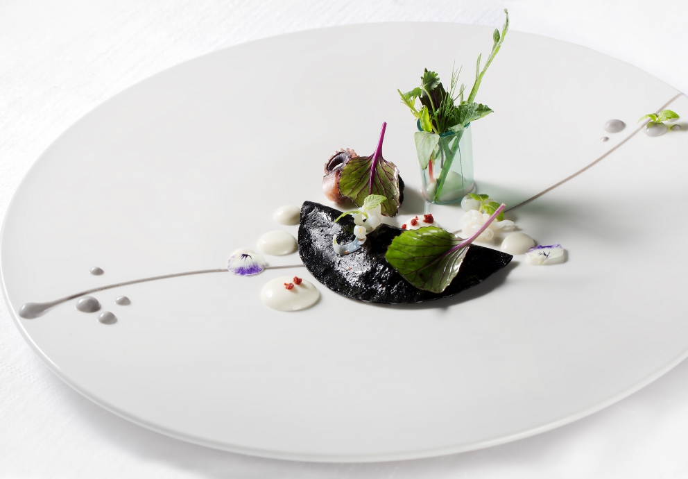 Photogallery






Iside De Cesare, La Parolina, Acquapendente (Viterbo)

Cod, garlic, oil and chilli pepper









Gianfranco Pascucci, Pascucci al Porticciolo, Fiumicino (Rome)

Eel tortelli in a broth of miso and caviar. Lake of Burano, WWF oasis: eel, myrtle and lentiscus. We’re collaborating with the WWF oases to give a "taste" to these places (photo by Andrea Di Lorenzo)









Claudio Petrolo, Claudio Petrolo, Gaeta (Latina)

Sea essence. Raw and cooked elements start an explosion with the flavour of the sea









Marco Bottega, Aminta resort, Genazzano (Rome)

Salmon, green apple and Orient spices. A meeting of sour, bitter, sweet and savoury









Rocco de Santis, Il Vistamare del Fogliano hotel, Latina

Red mullet in bread crust. A snack you can also eat with your hands, enclosing the scents of the South (I’m from Salerno): it’s like biting the sea together with onion, garlic, mint, lemon scents, raisins and pine nuts









Daniele Usai, Il Tino, Ostia (Rome)

Gnocchi with mandarin, with cod tripe and spinach. A historic dish from our menu has just returned in a current version









Gino Pesce, Acqua Pazza, Ponza (Latina)

Candele, cheese, pepper, white fish and courgettes. Created for a project we presented at Expo Milano with the goal of enhancing all the POD products of Lazio









Maurizio e Sandro Serva, La Trota, Rivodutri (Rieti)

Crayfish, roots, tubers, watercress with smoked trout and lake whitefish roe. A concentrate of flavours and lightness: roots, tubers and crayfish are steamed with aromatised water, with vegetable peels and Matcha tea. There’s no salt: the sapidity is giveb by the roe, the smokiness of the trout and the minerals in the vegetables and in the watercress, picked from our brook









Andrea Fusco, Giuda Ballerino, Rome

Venison sirloin with its jus and hibiscus, caramelised onions with blueberries and pistachio wafer. Serving a rich and lean red meat that is rarely served in this season









Cristina Bowerman, Glass Hostaria, Rome

Pasta and potatoes. Four different types of potatoes, with 4 different cooking methods, from mashed to crispy. Inspired by Bottura’s Compression of pasta and beans 









Anthony Genovese, Il Pagliaccio, Rome

Oyster, beetroot and coffee, snow of burrata. A journey across different scents, temperatures and textures









Francesco Apreda, Imàgo dell'hotel Hassler, Rome

Tandoori duck breast, cocoa earth and dried apricots. My personal take of a great classic from a continent I’m very fond of









Arcangelo Dandini, L'Arcangelo, Rome

My cipollata: zita with onion fondant with three spices. Taken from the Renaissance cipollata of Bartolomeo Scappi, the secret chef of 6 popes, who lived almost 30 years in Rome
 









Heinz Beck, La Pergola, Rome

S Campo. It’s the interpretation, with a modern take, of minestrone, made with lyophilisation. Each vegetable is cooked in the most suitable way so as to maintain its nutritional characteristics and then lyophilised. The result is 6, 7, 8 powders which are then put in the dish. The dish is served with scampi breaded with potatoes and soaked in front of the guest with a jus of this crustacean (photo by Janez Puksic)









Alba Esteve Ruiz, Marzapane, Rome

Chestnut cappeletti, raisins, smoked herring and seaweed infusion. Contrasts: the soft chestnut filling and a very persistent flavour, the smokiness and the fatness of the eel, the intense sweetness of the raisins, the sapidity of the seaweed infusion, the crispiness of the pasta...









Marco Baccanelli e Francesca Barreca, Mazzo, Rome

Roasted quails, baked tubers and roots, herb butter. The quails are served in their original shape, without deboning them. Our cuisine is moving towards a greater simplicity, and we can do so even by choosing classic yet not simple techniques









Roy Caceres, Metamorfosi, Roma

Mushrooms, flax brittle, black garlic and cream with Monviso blue cheese. In the seeming simplicity of an ingredient like mushrooms, contrasting textures give life to a dish in which their identity is surprisingly enhanced

 









Davide Del Duca, Osteria Fernanda, Rome

Snails, radish roots, Purgatorio beans, leaves and mustard seeds. A tribute to the material and primordial essence of the “earth” concept









Luciano Monosilio, Pipero al Rex, Rome

Vermicelli creamed in chicken broth, toasted spices and parmesan infusion. This recipe comes from spaghetti creamed in a very normal broth. The spices recall high mountains with the balsamic note counterbalanced by the sweet water of the parmesan. Almost like ramen









Marco Martini, Stazione di Posta, Rome

Steamed raviolo, chicken and broth of roasted potatoes. A meeting of east, west and my mother’s home









Francesco Sposito, Taverna Estia, Brusciano (Naples)

Tortellini with dandelion in a consommé of crustaceans. Introduced only recently, I’m very happy with it because it sums up the course we’ve taken









Vitantonio Lombardo, Locanda Severino, Caggiano (Salerno)

Mela Gras, that is to say mousse of chicken liver with dessert wine in a gelatine of annurca apples on a mixed leaf salad and hazelnuts from Giffoni. Creative and elegant cuisine with local products









Rosanna Marziale, Le Colonne, Caserta

Pasta with tomatoes. Paccheri from Gragnano with three types of tomatoes: San Marzano, piennolo and corbarino made with three different cooking techniques, with buffalo buttermilk









Pasquale Torrente, Al Convento, Cetara (Salerno)

'Ndunderi (ricotta gnocchi). These are pasta’s ancestors. They were born on the Amalfi Coast and are part of a project that this year, at Al Convento, will rediscover ancient local recipes









Christoph Bob, Monastero di Santa Rosa, Conca dei Marini (Salerno)

Linguine with nettle emulsion, salicornia and sea truffles









Giulio Coppola, La Galleria, Gragnano (Naples)

Spaghetti with lemon, with beef muzzle, pesto of olives, lupines and rocket salad. It says a lot about my territory and recalls the O Per e Muss, a street food recipe that people enjoy in the evenings in the South all year round









Pasquale Palamaro, Indaco del Regina Isabella, Ischia (Naples)

Sea foie gras. Cod liver prepared like the French geese one to make foie gras. Paired with cabbage, beetroot, ginger and toasted bread









Alfonso Caputo, La Taverna del Capitano, Massa Lubrense (Naples)

Seabream and prawns, figs and moka with sea urchin needles. The richness of the sea with the addition of an iodine note to enhance the taste through all the senses (in the photo, the summer version with cherry tomatoes from Vesuvius)






