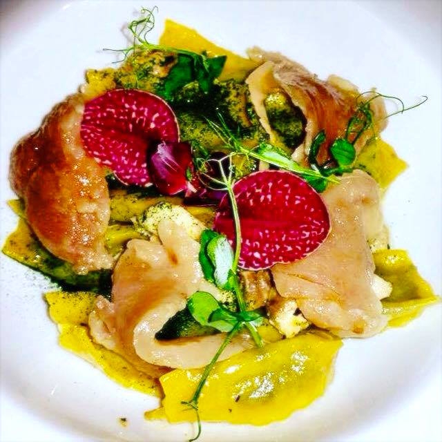 Photogallery






Enrico Crippa, Piazza Duomo, Alba (Cuneo)

Prawn and radicchio from Treviso cocktail – It’s a take on prawn cocktail with radicchio from Treviso first vacuum cooked and then opened as if it were a water lily. The prawn is seasoned with smoked pancetta cooking water. Then prawn bisque and a drop of shiso vinegar. Hence the classic dish acquires a new dimension, seasoned with choron sauce, which is basically a Béarnaise sauce with tomato









Andrea Ribaldone, I Due Buoi, Alessandria

Fassone beef agnolotti – Subtitle: “Memories of a trip to Japan”. Because I unite a true Piedmontese classic with a typical Japanese technique, soba in ice. Hence: cold agnolotti, in ice, with the intensity of the stuffing enhanced by the low temperature. I connect with the territory: not having agnolotti in the menu, in Piedmont, is blasphemy. However, I present them almost crispy. I took the recipe from my aunt, from Lu Monferrato, and remembered when as a child I would eat her agnolotti as soon as she made them, still raw and callous









Riccardo Aiachini, La Fermata, Alessandria

Chicken alla Marengo... – It’s an ancient recipe dedicated to Napoleon after the battle he won against the Austrians in June of 1800. With a contemporary take, of course









Davide Palluda, All’Enoteca, Canale (Cuneo)

Salted codf with milk and onion caramel – A veil of pungent and sweet caramel, with dried onion amplifying its flavour, on top of the salted cod cooked with milk. A sumptuous and intrigating dish, with white and milky tones, connected with my past and the history of many regions that don’t have any sea but have always been dreaming of it when cooking









Marc Lanteri, Al Castello di Grinzane, Grinzane Cavour (Cuneo)

Marco Martini’s Fassone steak tartare, light whole grain mustard mayonnaise and Parmigiano matured 30 months – This dish is a classic from the Langhe, to which I give a touch of France thanks to the light whole grain mustard mayonnaise









Barbara Scabin, Blupum, Ivrea (Torino)

L'isola galleggiante dei cugini d'Oltralpe rivisto al contrario [The floating island of the cousins from the other side of the Alps, seen upside down] – Quoting Wikipedia: it’s a relatively light and moderately sweet dessert, so much so that if prepared with the necessary attention, it can also be eaten by people suffering from diabetes, cardiac and celiac diseases









Marco Rossi, La Mugnaia, Ivrea (Torino)

Testacoda – These are cheeks cooked very slowly, tail wrapped in cabbage and fillet tataki with horseradish. In other ways, it’s Piedmontese fassone from the Langhe to Japan…









Marta Grassi, Tantris, Novara

Prospettiva nord: baccalà e culatello s’incontrano [Looking North, salted cod and culatello meet] – Two elements, two Northern regions, the former sober and simple, the latter opulent, meet and melt









Antonino Cannavacciuolo, Villa Crespi, Orta San Giulio (Novara)

Prawns, egg and tomato – My personal play with marine textures. This fake mini sunny side up egg is my south with earthly aromas such as tomato and inside a tartare of raw prawns. Red prawn from Sicily is still one of my favourite crustaceans, it’s a part of my life (photo credits Viaggiatore Gourmet)









Christian Milone, Trattoria Zappatori, Pinerolo (Torino)

Egg and eggs – Egg yolk with truffle, caviar, celery broth and parsley buttons... with herbs. There’s a world inside, it pulls down prejudgements and popular beliefs having everyone’s taste agree









Christian Meloni Delrio, Casa Baladin, Piozzo (Cuneo)

A cage made with quinoa, scampi and burrata – A simple yet flavourful dish, perfectly matched with our Wayan beer, a saison with scents of pepper









Davide Scabin, Combal.zero, Rivoli (Torino)

Saltimbocca alla Combal.zero – When you see a slice of prosciutto and some sage on top of a slice of meat you know it’s a "saltimbocca alla romana”. As of today, when you see a slice of prosciutto and some sage on a pasta lasagna (the egg-pasta must be at least 4 mm thick), you’ll know it’s a “saltimbocca alla Scabinsky”. The only variation: 3 different prosciuttos are used, one from Piedmont, one from Parma and one from Tuscany (from the great Fracassi)









Igor Macchia, La Credenza, San Mauro Torinese (Torino)

Felicetti Conchiglioni with squid ink, mussels, potatoes, chicory and candied ginger – All the flavour of Italian tradition plus the lightness of the Japanese one









Luca Zecchin, Guido da Costigliole, Santo Stefano Belbo (Cuneo)

Steamed and then roasted duck thigh with Abate pears, honey and pepper from Val di Maggia – A dish that encloses our tradition and connects our borders in Italy









Ugo Alciati, Guido, Serralunga d'Alba

Cardoons pears and anchovies – An unusual and intriguing pairing, the meeting of three Piedmontese ingredients that aren’t normally matched: hunchback cardoons from Nizza Monferrato, Madernassa pear and salted anchovy









Massimiliano Musso, Cà Vittoria, Tigliole d’Asti (Asti)

Rabbit, artichokes, liquorice and vegetal notes – I’m proud of this dish because in Piedmontese tradition roasted rabbit is always present in the Sunday lunch menu. I enriched it with a modern cooking technique (that is to say low temperature), pairing it with artichokes cooked in a vacuum with oil aromatised with toasted and blended peels and a liquorice mayo. Finally herbs, a vegetal touch coming from my kitchen garden









Claudio Vicina, Casa Vicina a Eataly, Torino

Kabuki 2013 – From 2013 onwards, it has undergone many changes. It’s a complete main course in terms of nutrients and calories. It was born as a starter in ancient times (tartrà). It then became more refined, in the shape of a pie, and today it’s a complete vegetarian dish. It’s called Kabuki because of it’s an explosion of colours, vegetables (4 or 5) and flavour. We serve it thus: a pie made with courgettes and Grana Padano matured 24 months in the centre of the dish. Finally, on top of the pie, we carefully put the egg yolk breaded with brioche crumbles fried in extra virgin olive oil









Matteo Baronetto, Del Cambio, Torino

Lasagne with sea lettuce and veal meat sauce (without tomato) – The sea lettuce lasagne is an almost natural and spontaneous version of Gualtiero Marches’s lasagne made with green pasta and pheasant meat sauce which I made again and again. It is natural and spontaneous in that the idea is not of giving a new take on the classic lasagne but a chance to a celiac to taste the primary taste of lasagne. The sea lettuce in fact shows no difference with the classic Italian green coloured pasta









Marcello Trentini, Magorabin, Torino

Puntarelle/Burrata/Anchovies- A delicious and complex snack uniting North and South... Hanging in the balance between bitter, sapid, sweet and umami









Alessandro Mecca, Spazio 7 – Torino

Pork belly, apple, oyster and ear – A journey across strong and delicate flavours, where the tradition of my territory is renewed in the dish by meeting the sea (photo by Edoardo Gatti)









Stefano Borra, Vo, Torino

Jerusalem artichoke cooked in two ways, cardoons au gratin, rabbit meat sauce, white truffle – My bagna caoda, served in a "balon”









Marco Sacco, Piccolo Lago, Verbania

Bottoni di lago – A dish that brings back the memory of the days spent by the lake as a child









Maurizio Macario, Nazionale, Vernante (Cuneo)

Smoked fario trout, its roe, acid curdle and gomasio – A new dish, Occitan-style. The iridea trout from the Maritime Alps is lightly smoked, served in a crispy cannolo (like a savoury version of chiacchiere), slightly sour goat’s and cow’s milk cream, with gomasio adding a sapid note









Christian and Manuel Costardi, Cinzia - Da Christian e Manuel, Vercelli

iNvidia – A sweet by Manuel, who created a new word: "cuocodolce". In his evolution, he’s getting closer and closer to the kitchen and his sweets are becoming real courses. This cake is born from the use of endive as a container for a cream of liquorice, plus almonds and capers









Agostino Buillas, Café Quinson, Morgex (Aosta)

Non di solo fumo... [More than smoke] – The disregarded veal sweetbreads deserve more! Served on a sour cream with chives, herring roe and juniper smoke









Federico Zanasi, Snowflake del Principe delle Nevi, Cervinia (Aosta)

Stewed cabbage, camomile, goat Hollandaise with burnt almonds and white truffle – I’m proud of this dish because I made an undervalued vegetable nobler, and upturned the concept of vegetables as a side dish. In this case the taste of the meat is a side to the vegetable






