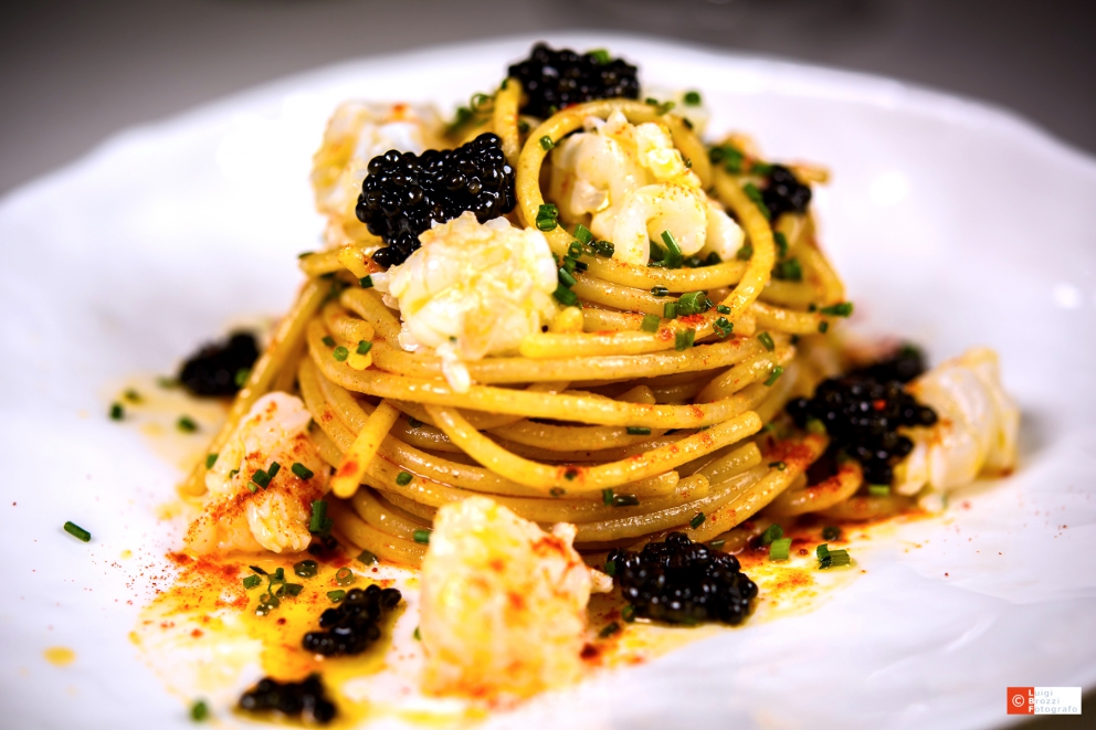 Photogallery






Mario Cornali, Collina, Almenno San Bartolomeo (Bergamo)

Stewed snails from Almenno, fumet of powdered corn from Prato – This dish is the consequence of the meeting with Andrea Togni, a young snail breeder from Almenno. I was inspired by the fact that I had an organic snail farm only two kilometres from home









Antonio Cuomo, Hostaria del Relais San Lorenzo, Bergamo

Dreaming… Cesar salad – We’ve rebuilt a great classic by changing all its textures, with water of Parmigiano, iceberg salad ice cream and confit tomato mousse









Giuliano Pellegrini, Lio Pellegrini, Bergamo

Salad with tripe, tuna, fried polenta, cucumber and white beans from Soragna – Tripe is a dish I wanted to change because I always had a good memory of it. My grandmother Alice made an excellent tripe stew...









Antonio Borruso, Umami, Bormio (Sondrio)

Neve al sole [Snow in the sun] – A dessert uniting saffron, litchi and a white chocolate mousse









Enrico and Roberto Cerea, Da Vittorio, Brusaporto (Bergamo)

Steamed king crab with hazelnut praliné and bottarga – An intriguing and delicious dish, where the white and reddish meat, firm and as sweet as honey, is finely matched by the sapidity of bottarga, much rougher and stronger. All this paired with the fattiness and crispiness of the best hazelnut in the world, the tonda gentile from Cortemilia









Nadia and Giovanni Santini, Dal Pescatore, Canneto sull'Oglio (Mantua)

Mountain potato cream with poached eggs, tuna bottarga, asetra royal caviar and capers – A great dish from Dal Pescatore’s tradition yet conceived and prepared by the new generation in the kitchen, that is to say by Giovanni Santini – photo by Culinaire Saisonnier-Dirk Kerstens









Enrico Bartolini, Devero, Cavenago di Brianza (Monza Brianza)

Risotto Arlecchino – Sauce below, rice on top. A return to the Baroque with a modern interpretation









Daniel Facen, Anteprima, Chiuduno (Bergamo)

Tuna salad with sour egg, purple potatoes and olive oil – It’s like a Salad Niçoise in which the tuna is seared and then cooled in water and ice. The purple potatoes have different textures, in pieces, as a small purée and dehydrated. The tomatoes are confit, the French beans are cooked with ultrasounds, the egg in vinegar and the oil is in a sugar capsule, with anchovies from the Cantabrian Sea









Davide Oldani, D’O, Cornaredo (Milano)

Milanese style apple marrow – Because it represents the tradition of a Milanese “dish” but with the lightness of good modern cooking






