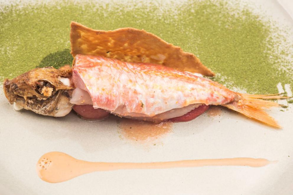 PhotogalleryRay wings &ldquo;alla stimpirata&rdquo;
Crispy Gelato Sandwich with Sicilian truffle from Palazzolo Acreide
Blue tailed fish lasagne with wild fennel and saffron 
Alleva Bio Beef in falsomagro
Oyster
Ricotta and marjoram ravioli with goat with wild herbs 
