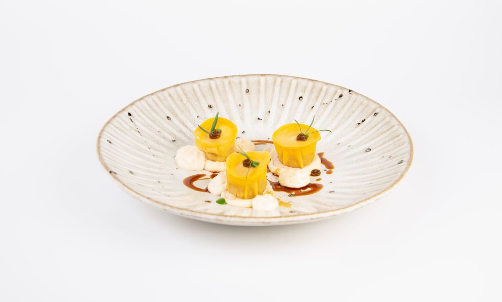 Tortelli di cotechino cremoso, crema di pajata e mousse di Parmigiano Reggiano: è il Piatto delle feste di Luca Landi