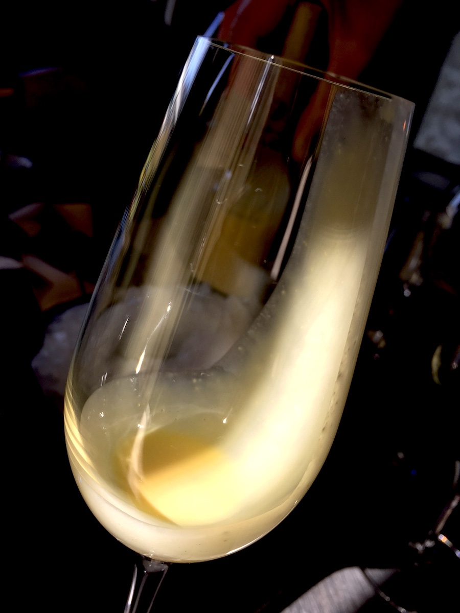 Galleria fotografica






L'edificio che ospita il Noma in una splendida giornata di sole lo scorso sabato 27 agosto, vigilia della quinta edizione di MAD5









Come in un qualsiasi ristorante di mare delle coste italiane e del mondo, il vassoio del pescato (in questo caso nei mari del Nord) viene portato al tavolo e spiegato









First apple of the new season, la prima mela della nuova stagione, una Golden skin per la precisione, per aprire un pranzo superlativo









Una volta aperta, colpo d'occhio a parte, ecco sferette di mela immerse in uno sciroppo di rose e mele fermentate due anni. La fermentazione è una parola dalla quale lì - e non solo lì - proprio non si può prescindere.









Senza parole, così siamo rimasti davanti a questi quattro frutti di fine stagione: in basso a destra (e poi in senso orario) una prugna avvolta in una pellicola naturale, nocciola fresca immersa in olio di nocciola, rosa canina ripiena di frutti di bosco e un fiore di nasturzio farcito con un ribes bacca nera









Un'immagine ravvicinata dei quattro assaggi. Sorprendente il rumore secco della nocciola schiacciata tra i denti. Quattro strepitose idee per accompagnare cocktail vegetariani









Bacche di gelsi, ma di gelsi speciali, quelli che crescono sull'isola di Bornholm, isola danese posta a oriente rispetto al nucleo principale del regno scandinavo, tra le coste della Svezia e della Polonia









Radish pie, tortino di ravanelli. Tale la bellezza del piatto che poteva facilmente deludere. Così non è stato









Chi ha portato in tavola questa preparazione, chiedendo scusa sorridendo, l'ha presentata come una sorta di caprese per via dei pomodorini essiccati e della cagliata di latte fresco. Per il Noma un passo importante: per la prima volta il pomodoro fa capolino nel suo menù. A completare il tutto ribes bianco e ribes nero, olio di colza.









A light stew of fruit and vegetables, così si chiama questa bontà. Dominano le fave e il profumo d'insieme è dato da una estrazione di ciliege









Capolavoro: Sea urcin and cabbage, ricci di mare e cavolo dove una foglia di cavolo svolge la funzione della pasta sfoglia, all'uovo e non, e il ripieno è di ricci in purezza, carnosi e intensi. Arrivano dalle acque gelide dei mari oltre Capo Nord









Un dettaglio del ravioli ai ricci di mare









Langoustine, onion and lavander: dopo l'intensità dei ricci un grande e delicato equilibrio tra i profumi di scampi, cipolle e lavanda









Superbo e godurioso granchio reale prima passato al vapore e poi spadellato con burro aromatizzato agli scampi, le teste per la precisione. Il tutto gustato con le mani









Un esterno del Noma, con il ponte sullo sfondo e tanta gente a camminare rilassata tutt'attorno









Crisp of wild plums and peas, croccante (l'ho sbriciolato al primo morso) con prugne selvatiche e piselli. Ottimo tocco finale con i fiori del timo e del limone









Crisp of wild plum and peas, tanto per ribadire bellezza e bontà









Steamed king crab and egg yolk sauce, la polpa del granchio reale cotta al vapore e servita in un'ardita salsa al tuorlo. Un piatto da meditazione









A ogni cambio di portata il cambio delle posate. Davanti a noi un coltello da Fiorentina e il cervello è andato immediatamente in quella direzione. Poi ecco Charred greens with a scallop paste, foglie di varia natura essiccate alla griglia e spennellate con una pasta di cappesante. E il coltello Laguiole? Una provocazione, ovvio.









#MADMAD5, tanto per non scordarsi perché eravamo a Copenhagen









Nasturzio, gamberi e funghi ma è un mio nome di fantasia perché questa straordinaria minestra non è ancora in carta tanto che non è stata riportata nel menù ricapitolativo che viene consegnato all'uscita.









Un dettaglio della precedente pietanza, qualcosa di stregante: ravioli di foglie di nasturzio e ripieno di gamberetti









Momento di relax, plin plin









Rombo grigliato e salsa di gamberi dolci. Immaginatevi una mini costata di mare, un incredibile giocare tra la sapidità del rombo, la sua gelatinosità e la grassezza esaltata dal calore









Foto ricordo con Renè Redzepi per Cesare Battisti e Cristina Bowerman. Attenti: mad in inglese vuole dire matto, ma in danese cibo.









Ingresso nel mondo dolce con A dessert of sheep's milk and ant paste, latte di pecora e pasta di formiche. Il verde è dato dall'acetosella e lo zucchero è di canna. Per me le formiche sono puro marketing









Il Mottarello del Noma: Grilled rose ice cream and elderflower, fiore di sambuco. E il gelato usato per copertura non è di cioccolato come è facile credere, bensì di orzo fermentato









Spettacolo: muschio cotto nel cioccolato e ciocco-porcino.









In Italia uno pensa subito al Vov, a un liquore all'uovo e non ci si sbaglia. Il tutto con l'aggiunta di sambuco e acquavite al Gewürztraminer






