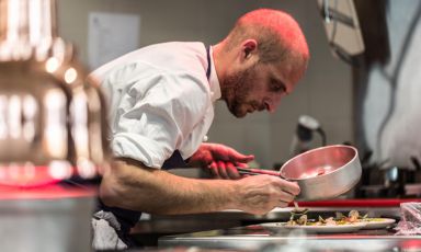 Giovanni Passerini at work in the kitchen of his restaurant in Paris
