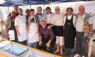 In the centre, standing, Paola Bertini in a photo taken in Rivolta d&rsquo;Adda (Bergamo), during a risotto-based charity event. Charity association ilbuongustaio, tel. +39.0363.370292, with the help, among others of chef Sergio Mei and actor Enrico Bertolino, fights for some important projects in Africa and Brazil. For info, g.brandazza@iol.it and tel. +39.0363.370877 and +39.347.5512784