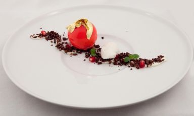 Pomegranate, beer and chocolate by Fabrizio Tesse of Locanda d'Orta in Orta San Giulio (Novara), a sweet complement to the Scallops in Savoy cabbage leaf that earned him the mention for best savoury recipe in the second edition of Premio Birra Moretti Grand Cru