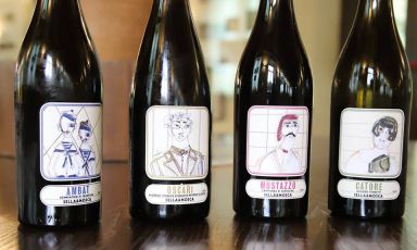 Le quattro bottiglie che portano le etichette firmate da Antonio Marras
