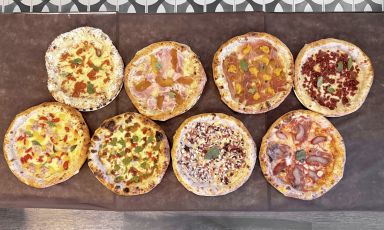 Le otto pizze con frutta e verdura realizzate da Gino Sorbillo per l'iniziativa Harvesting Happiness
