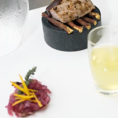 Wild boar cube steamed with liquorice and orange with Xocoline chocolate
and aniseed onion compote

