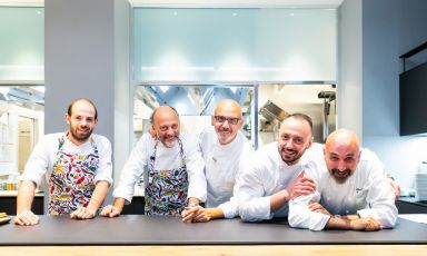 Foto al pass dei protagonisti della cena di compleanno di&nbsp;Identit&agrave; Golose Milano. Nella foto, Moreno Cedroni, Franco Pepe, Alessandro Rinaldi e Andrea Ribaldone. Con loro, sulla sinistra, anche Alessandro Mandrioli, che lavora con Cedroni
