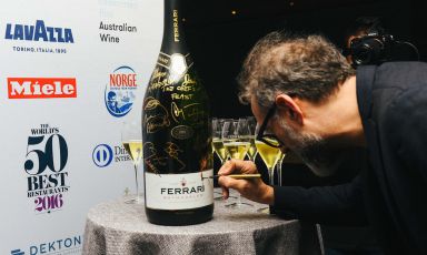 Massimo Bottura on the night of the 13th of June in New York, after his brand new victory in the 2016 World's 50 Best Restaurants, signs a magnum of Metodo Classico Ferrari. Copyright The World’s 50 Best Restaurants