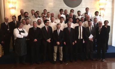 Group photo with chefs and institutional representatives after signing the Protocollo per la cucina italiana. In the first row, Fulvio Pierangelini, Vincenzo De Luca (general director at Promozione del Sistema Paese for the Ministry of Foreign Affairs), the president of the Agricultural Commission at the Chamber of Deputies Luca Sani, the undersecretary Ivan Scalfarotto, ministers Paolo Gentiloni and Maurizio Martina, Ice president, Riccardo Monti, and Antonio Santini