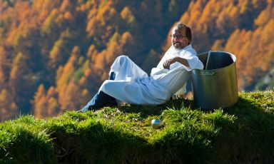 Norbert Niederkofler lying down among his pastures in the Dolomites. The chef at St. Hubertus in San Cassiano (Bolzano), 2 Michelin stars, has recently become the promoter of "Cook the Mountains", a project that aims at promoting the whole food supply in the mountains. He will illustrate the details at Identità di Montagna, Identità Milano’s new-born format, on Sunday 8th of February 2015