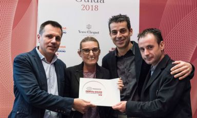 Oriol Castro, Mateu Casañas and Eduard Xatruch of Disfrutar – Barcelona. Peirone, Top Gastronomy Manager at Gruppo Lavazza hands them the Best Foreign Chef of the year award assigned by Guida di Identità Golose 2018  
