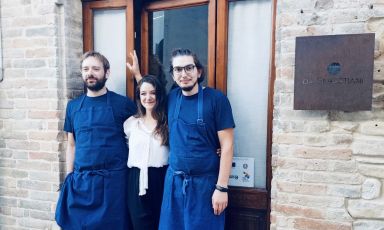 Carlo Sebastiani, Alice Vannicola and Maicol Pasquali in front of the entrance of restaurant da Sebastiani in Ortezzano, in the province of Fermo, opened on the 2nd of June 2021

