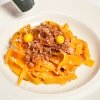 Franco Cimini, Antica Osteria del Mirasole, San Giovanni in Persiceto (Bologna)

Tagliatelle with old-style courtyard meat sauce. An ancient recipe from the countryside around Bologna which includes the less noble parts of courtyard animals (giblets) including crest, gizzard, liver and embryo eggs
 
