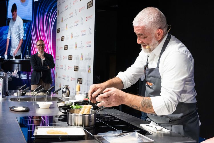 Left Federico De Cesare Viola, Editor in chief of Food&Wine Italy and chef Atala (right) grappling with cassava