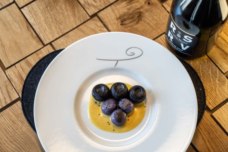 Acini d'uva, purple potato gnocchi, ricotta and must, by Davide Oldani