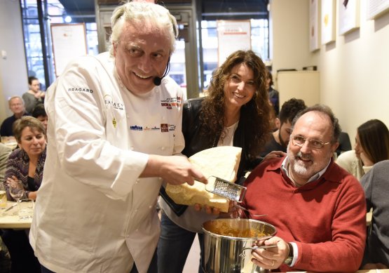 Scabin serving Amatriciana right from the pressure cooker with Elisabetta Serraiotto of Grana Padano and Paolo Marchi of Identità Golose