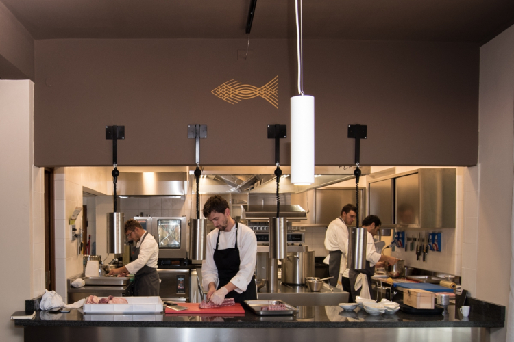 The open view kitchen. In the middle, Ivan Maniago, 31