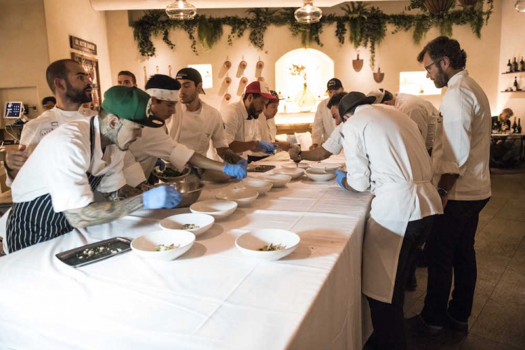 Cracco at work with the first course: Monograno Felicetti Fusillone Matt, sorrel, mackerel and black garlic 
