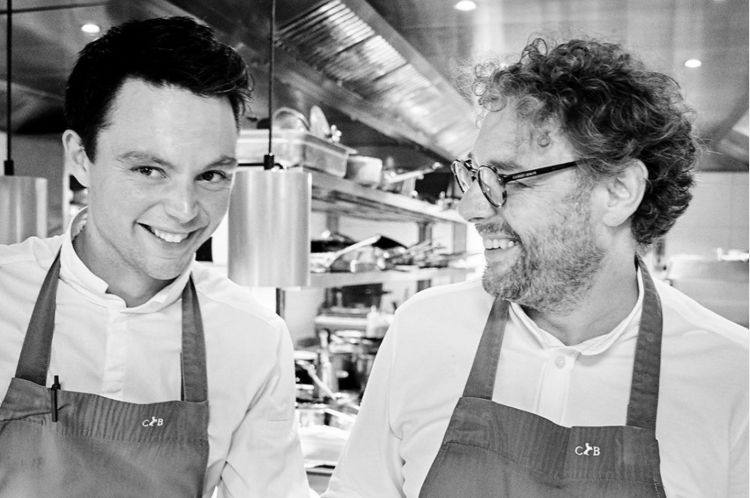 Arnaud Donckele (to the right) with sous chef Au