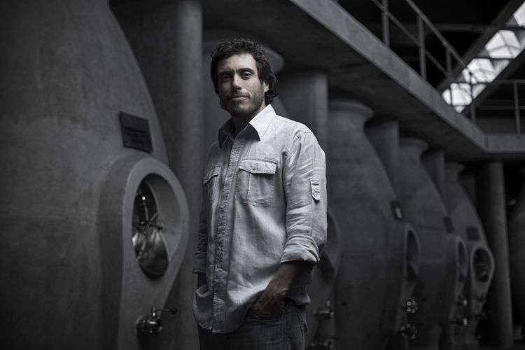 Sebastián Zuccardi and the cement tanks designed by himself. It took him six years of work and research with his team of agronomists to design these tanks, under the Zuccardi patent
