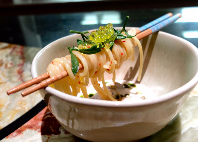 Spaghetti with garlic and oil, hazelnut milk and seafood 
