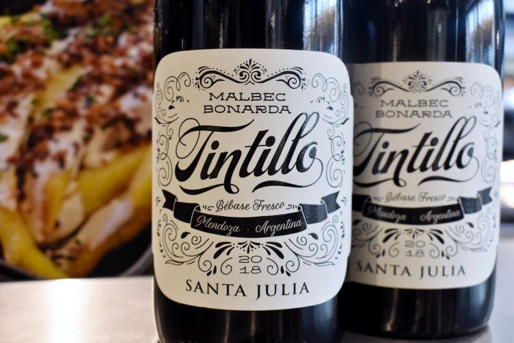 Tintillo - “to be drunk cold”  - from Santa Julia, a historic winery owned by the Zuccardi family. Produced with carbon maceration, pressing the entire grapes with no destemming, it results in a fruity and fresh wine, with an excellent acidity (89 points from Parker for the 2016 harvest)
