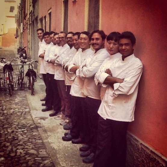 The Japanese chef together with the kitchen staff at Osteria Francescana. You can also notice Massimo Bottura in the middle