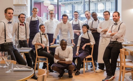 A group photo with the kitchen team from Papillon
