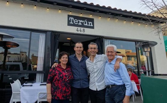 The Campilongo brothers with their parents in front of their restaurant in California
