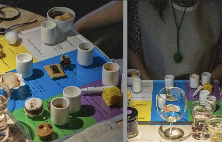 2020 - Altrove
«Il gioco prevedeva di indossare per ogni area colorata una collana con un mini gomitolo del medesimo colore intriso di una fragranza speciale, realizzata da Lorenzo Danteferro. L’ospite veniva sollecitato ad andare in ascolto, chiudere gli occhi durante la degustazione per realizzare un viaggio emozionale. La parte limbica, fortemente sollecitata dal profumo e associata al colore e al gusto portava altrove, nel tempo e nello spazio. Il gioco terminava con un cucchiaio di polvere scoppiettante, coperto da un foglio d’oro, da assumere in combinazione ad un concentrato di vino passito allo zafferano e liquirizia. Il nettare veniva servito in un bicchiere con una campanella (che regalava un suono gentile) e un piccolo gomitolo intriso di Olibanum che l’ospite avrebbe portato al termine del piccolo viaggio»