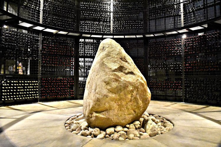 The huge stone, left where it was found, around which the room for the bottle refining was built 
