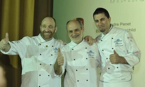 In the middle, between chef Lino Sauro of the Gatt