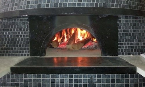 The oven of the gourmet pizzeria at Palazzo Petruc