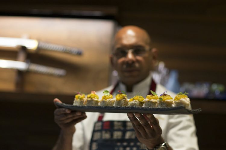 Priyan è nato in un piccolo villaggio dello Sri Lanka, ha abbandonato presto la carriera da criminologo per dedicarsi totalmente alla sua passione per la cucina, appresa nel corso dei suoi numerosi viaggi (dall'Asia alla Papua Nuova Guinea, da Bali alla Thailandia fino all'Europa). Gavetta a Tokyo sotto l'egida del maestro Kan, poi il primo incarico da chef, al Four Seasons di Bali, nel 2000. Arrivato in Italia, ha lavorato per un breve periodo in diverse realtà milanesi per aprire in seguito il suo primo Wicky's nel 2011, in via San Calocero, e spostarsi nel 2015 in corso Italia 6, luogo in cui oggi esprime al meglio la sua personalissima filosofia culinaria e di vita
