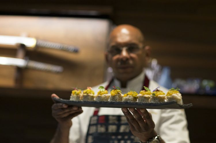 Priyan è nato in un piccolo villaggio dello Sri Lanka, ha abbandonato presto la carriera da criminologo per dedicarsi totalmente alla sua passione per la cucina, appresa nel corso dei suoi numerosi viaggi (dall'Asia alla Papua Nuova Guinea, da Bali alla Thailandia fino all'Europa). Gavetta a Tokyo sotto l'egida del maestro Kan, poi il primo incarico da chef, al Four Seasons di Bali, nel 2000. Arrivato in Italia, ha lavorato per un breve periodo in diverse realtà milanesi per aprire in seguito il suo primo Wicky's nel 2011, in via San Calocero, e spostarsi nel 2015 in corso Italia 6, luogo in cui oggi esprime al meglio la sua personalissima filosofia culinaria e di vita
