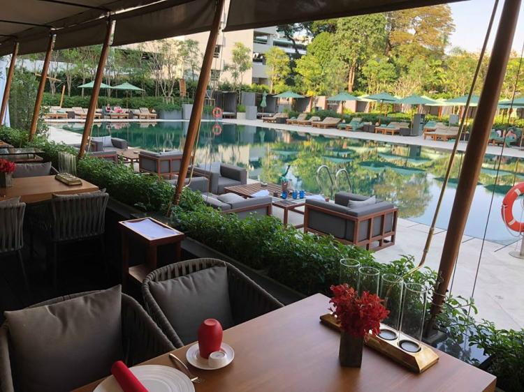 The restaurant veranda overlooking the swimming pool
